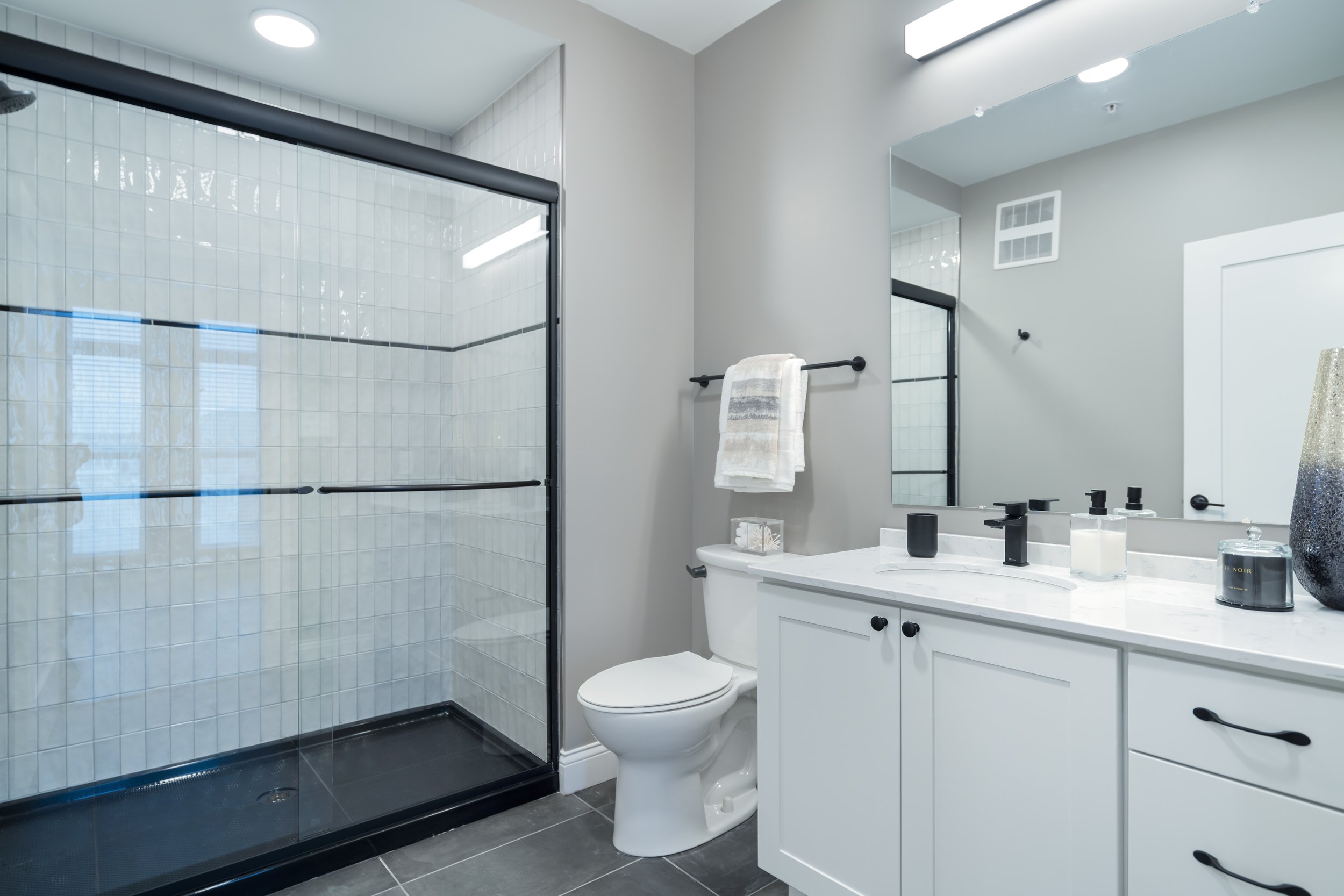 Quartz Vanity and Tile Bathroom Floor