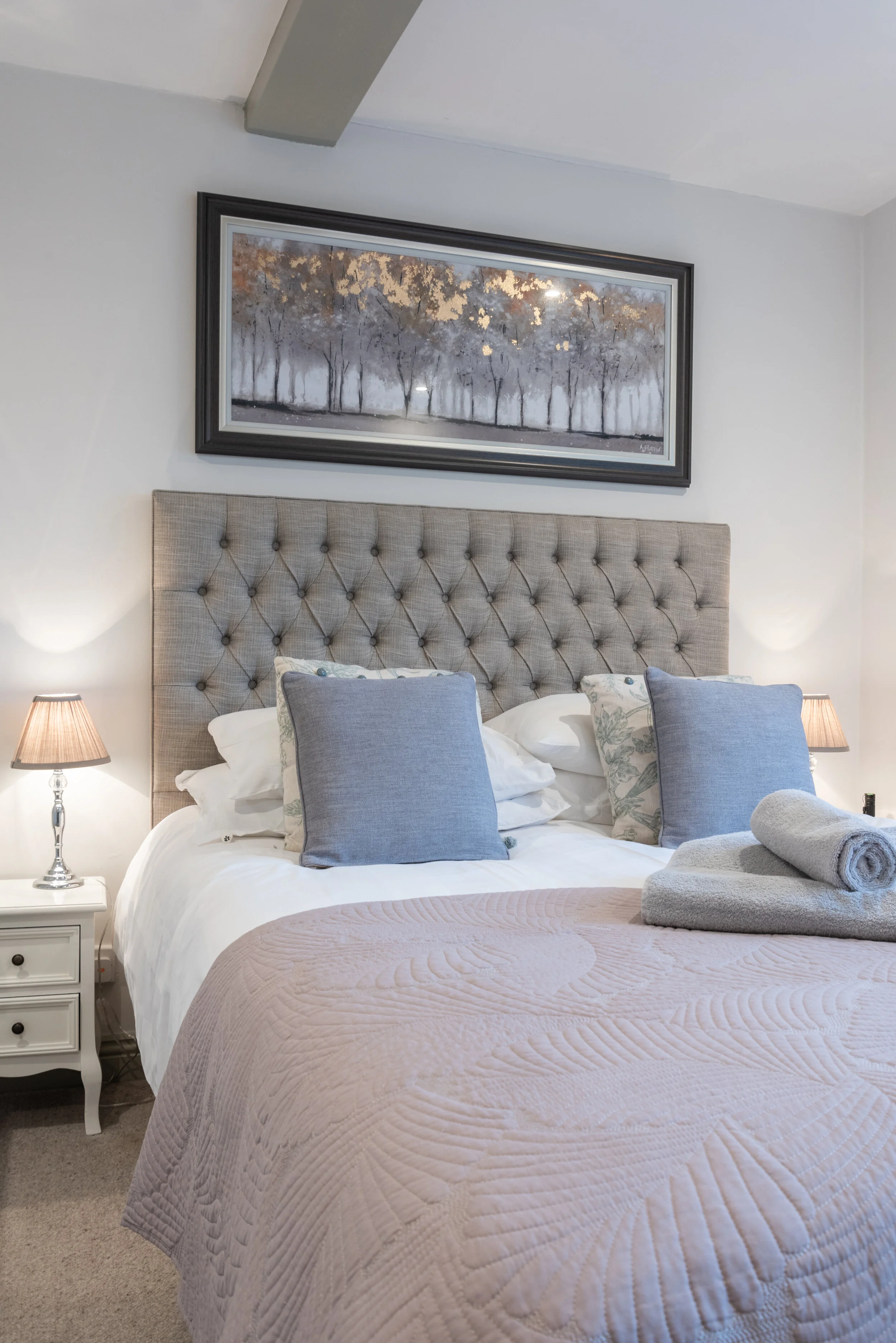 An expertly styled luxury holiday let bedroom designed to maximise guest appeal and property value