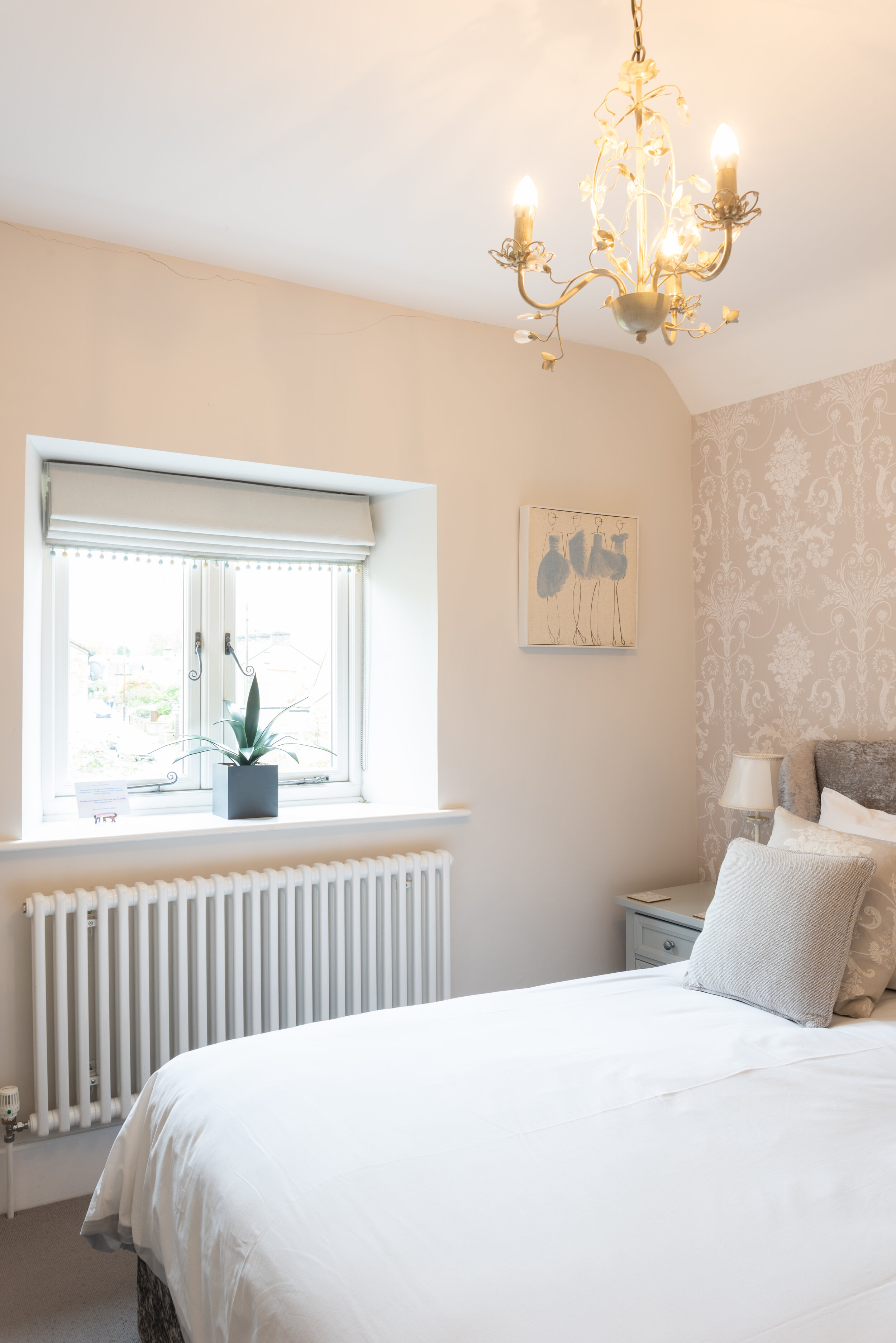 A warm, welcoming corner of a luxury holiday let property showing premium styling and guest amenities