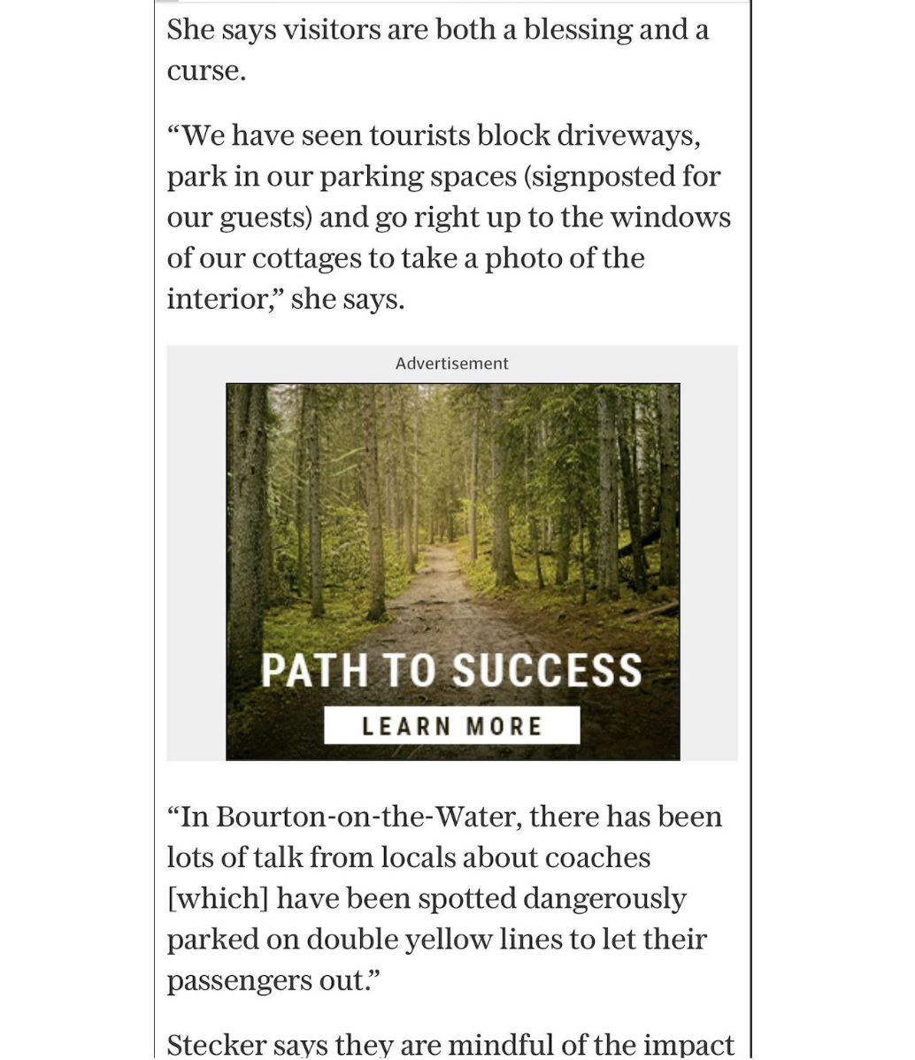 A digital news clipping continuing a feature article with quotes from Amanda Stecker on tourism impacts, split by an inline advertisement banner showing a forest trail labeled Path to Success