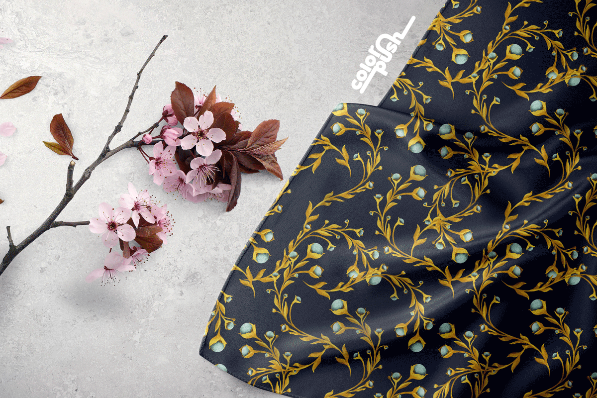 Silk scarf mockup featuring my Blooming Golden Vine patterns in Midnight Blue and Blush