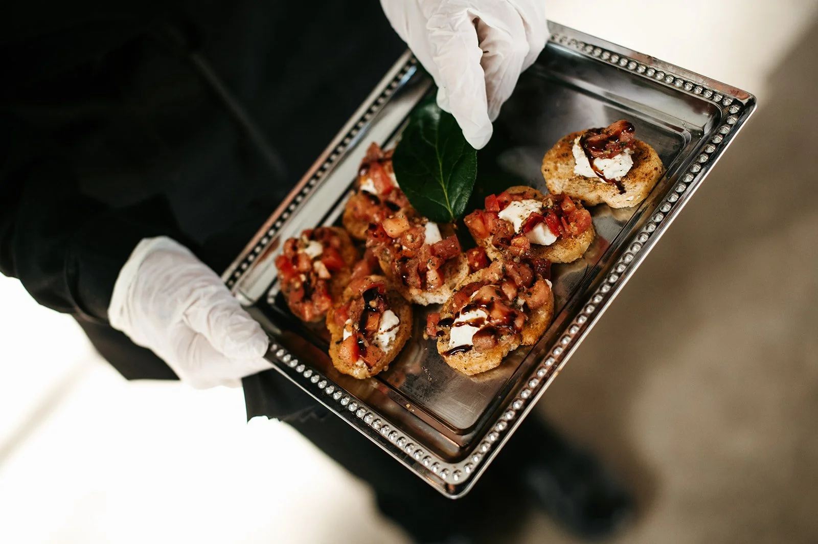 Partner with Catering companies that will compost, recycle and possibly use any leftover food so as to limit waste as much as possible.