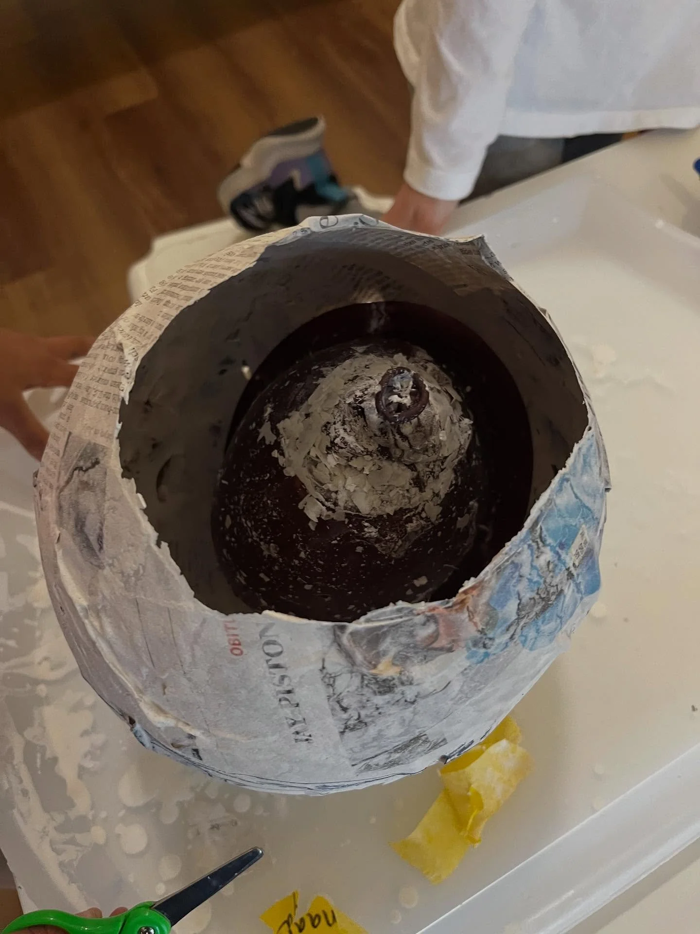 Part two of our paper mache project with the K-2nd grade Afternoon Art Explorers: Children were so excited to arrive at the studio and see that the paper mache had hardened. They GASPED in excitement and awe when they cut the balloons inside, watched