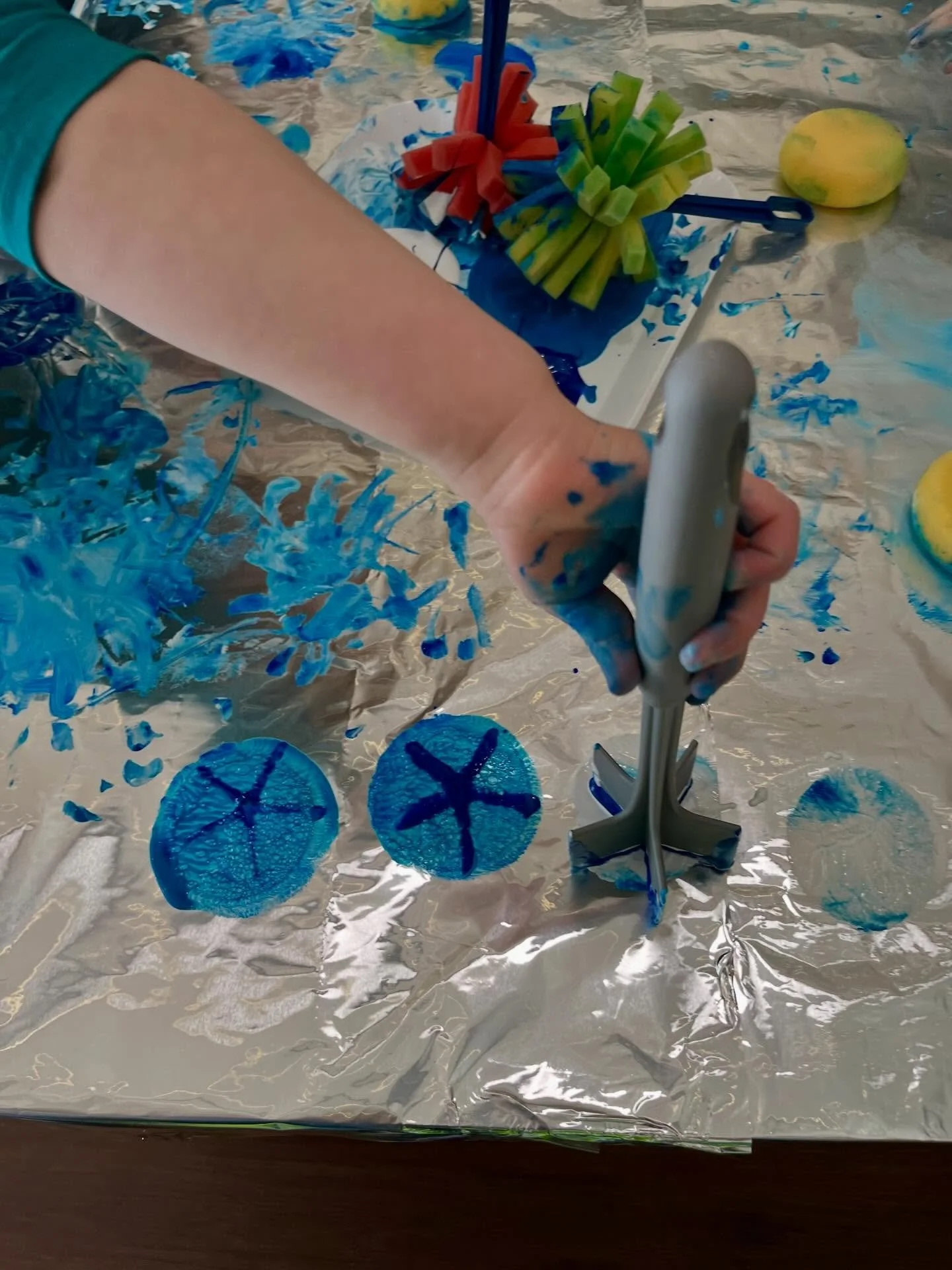 Children in Sensory Fun classes (18 months-5 years) were welcomed into a winter wonderland this week! We had instant snow (feels like real snow!!) with trucks for plowing, tin foil covered tables and different tools for creating snowy day scenes, and