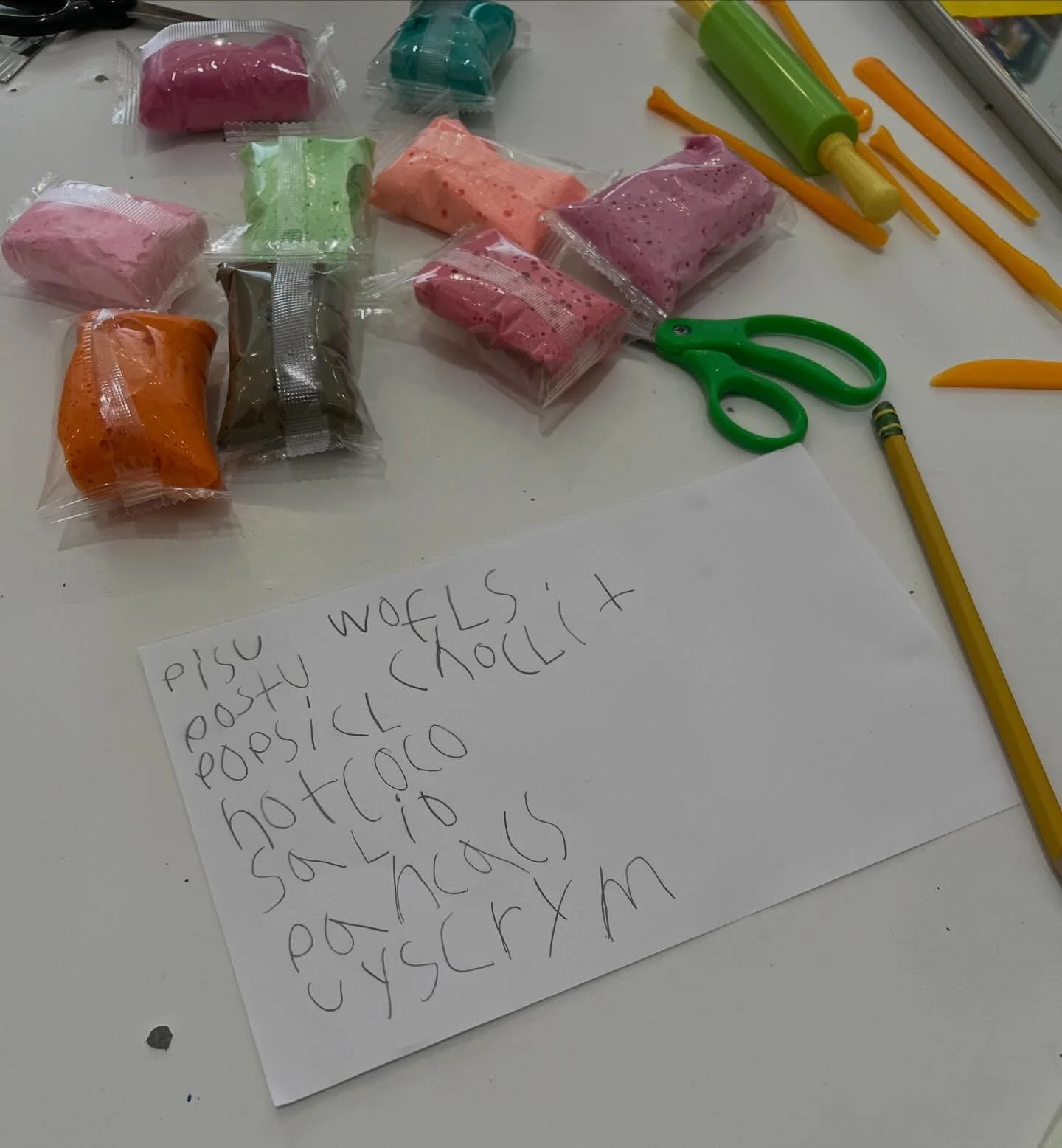 Our Afternoon Art Explorers (K-2nd grade) began creating their restaurants this week. They brainstormed what types of food they would want to serve and then used air dry clay to make mini menu items! They made burgers, croissants, strawberries, smoot