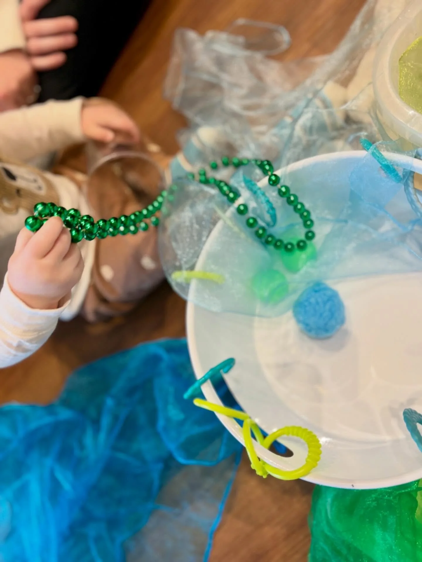 Messy Minis (6-18 months) - We had so much fun with this group of one-year-olds today! These littles explored every provocation to its fullest- dumping, scooping, splashing, sliding, building, drawing, and more!

Stay tuned- Messy Minis will be switc