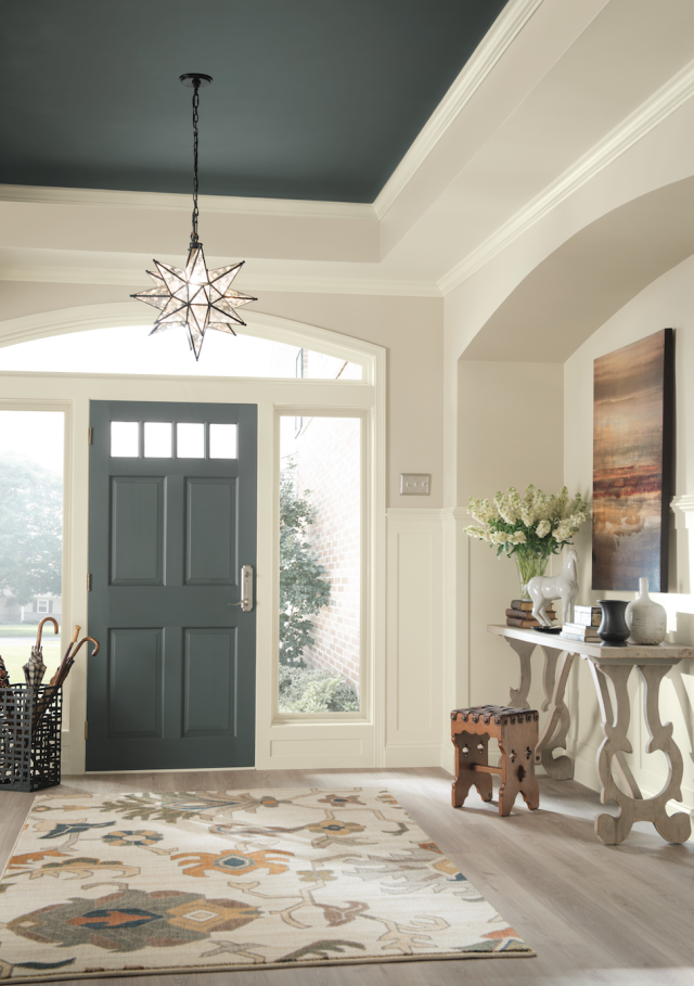 Ceiling painted with bold green color for accent