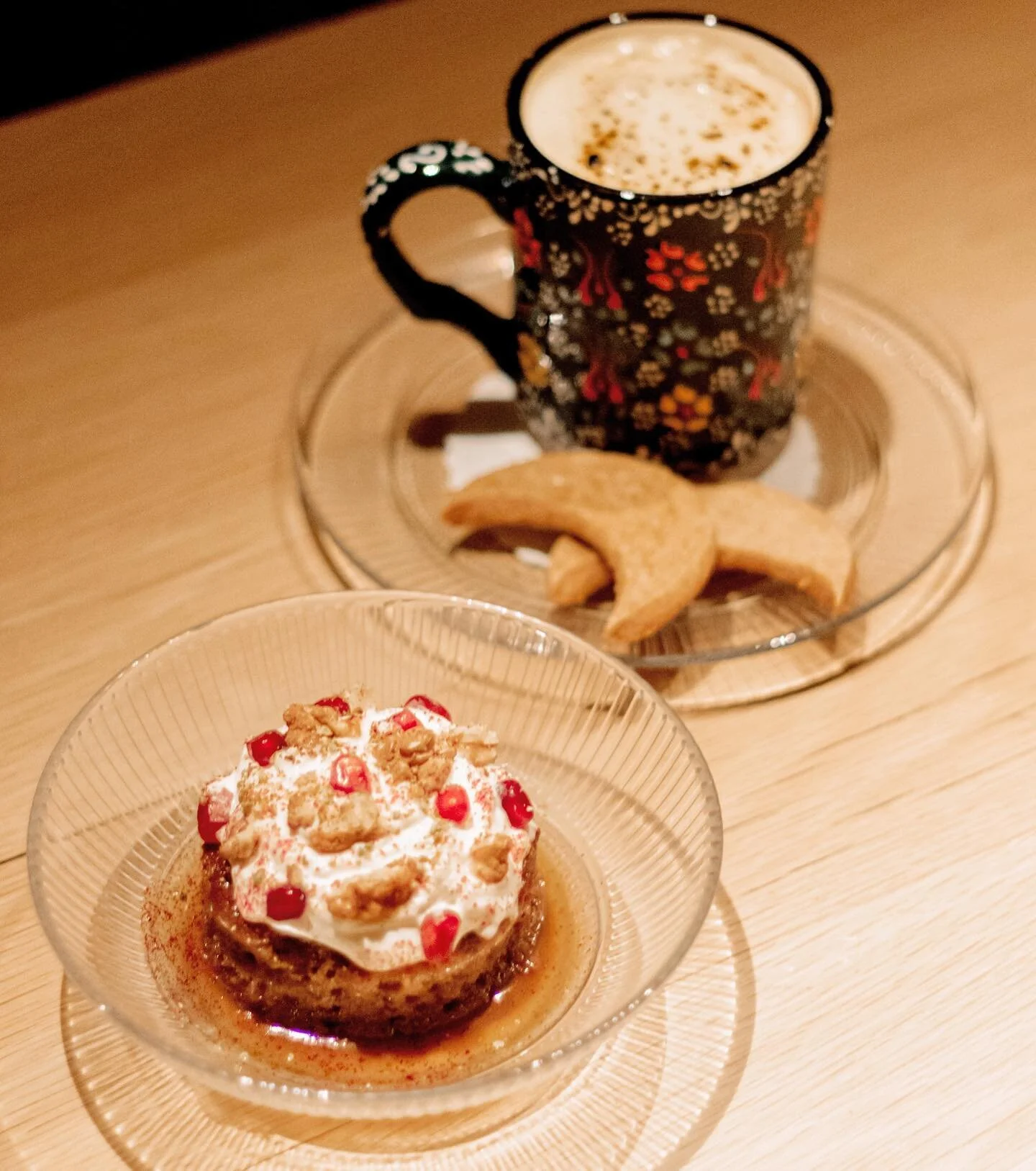 Warm date cake with orange blossom chantilly, pomegranates &amp; spiced walnuts

-Warm cake of Medjool date and spice, soaked in a light date and butter syrup; covered with aromatic orange blossom whipped cream, sprinkled with fresh pomegranate seeds