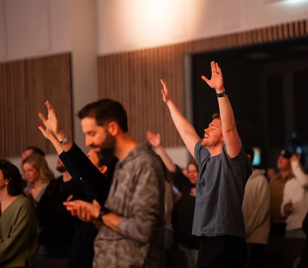 The congregation worshipping together during a Sunday service