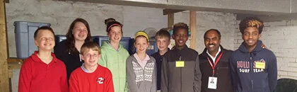 Zion Middle Schoolers with Rev. Stanish Stanley, and two After School Tutoring students - Abel and Ammanuel