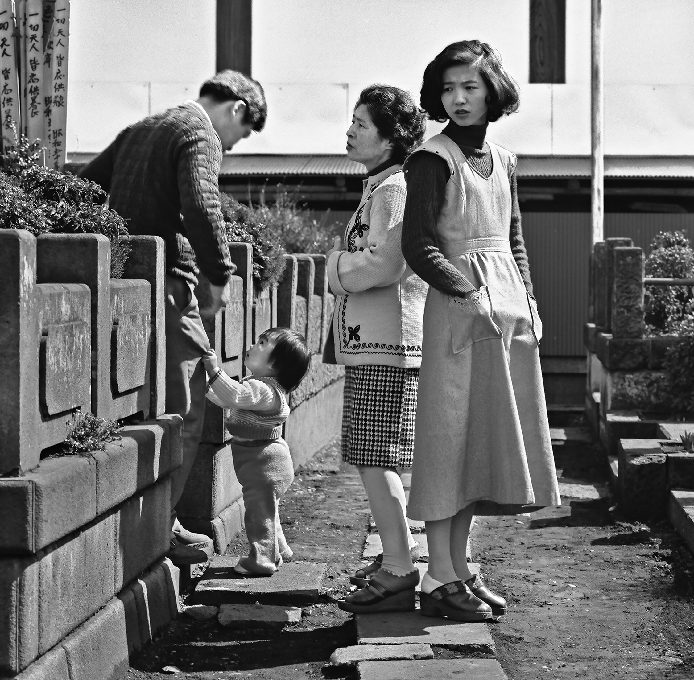 Visiting graves of ancestors, Ogikubo, Suginami district, Tokyo, March 1976.