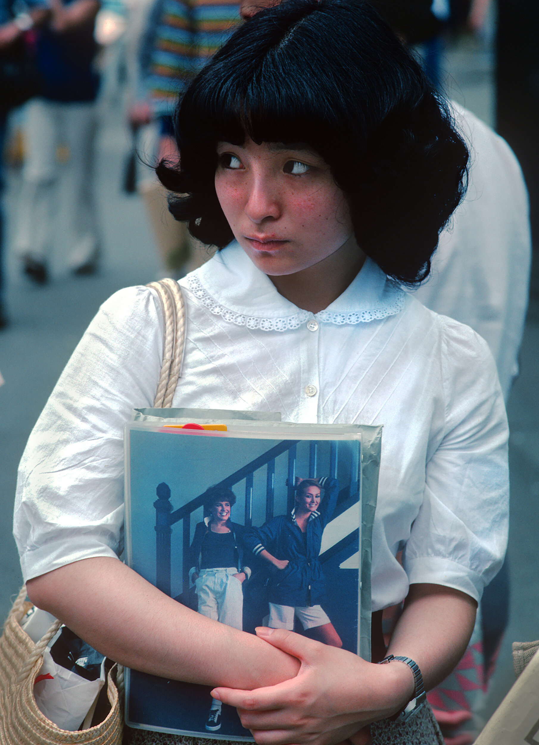 Collegiate with notebook, waiting for a friend, Shibuya Station, Tokyo 1978.