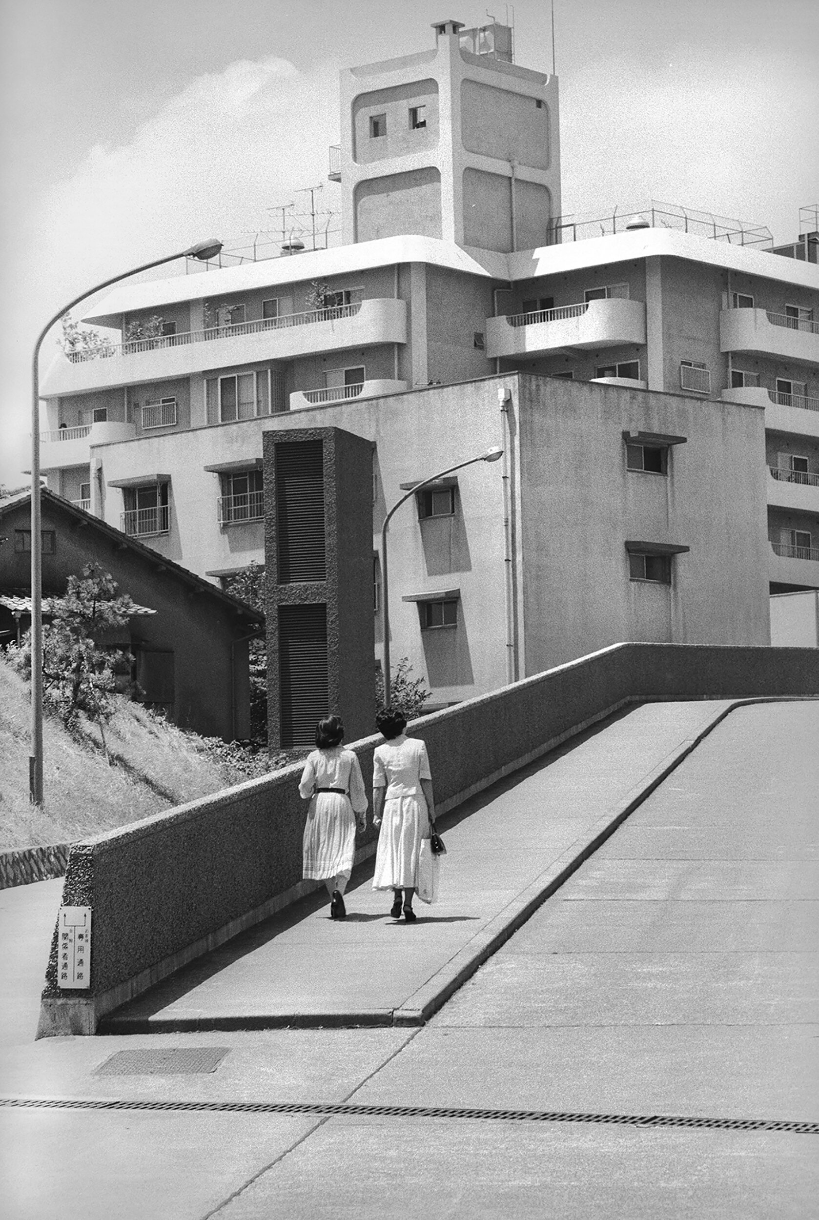 Late afternoon stroll in the business district, Kamiyacho, Tokyo, July 1976.