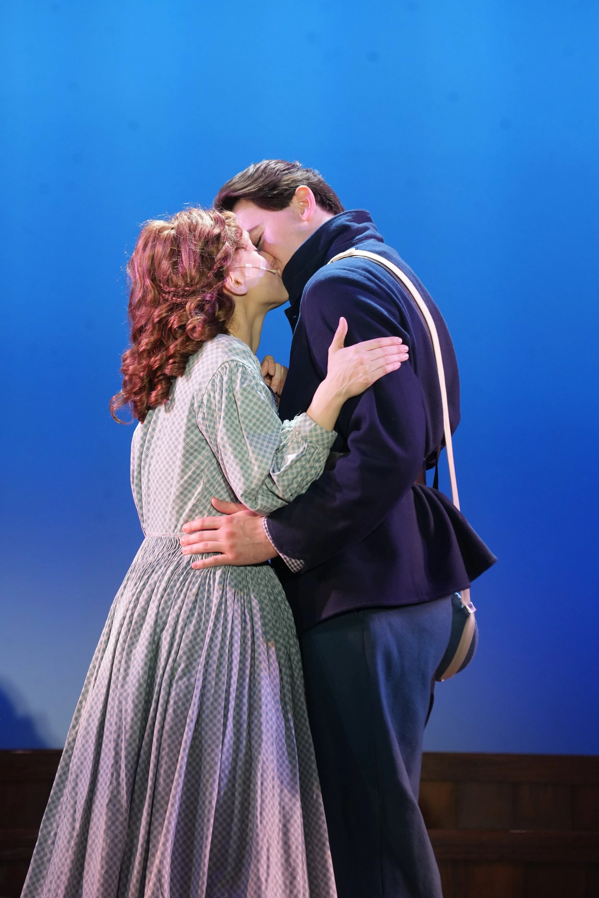 Jarrett Bloom as 'John Brooke' in "Little Women" (2026) at the Riverside Center for the Performing Arts, with Sarah Mae Andersen as 'Meg March'