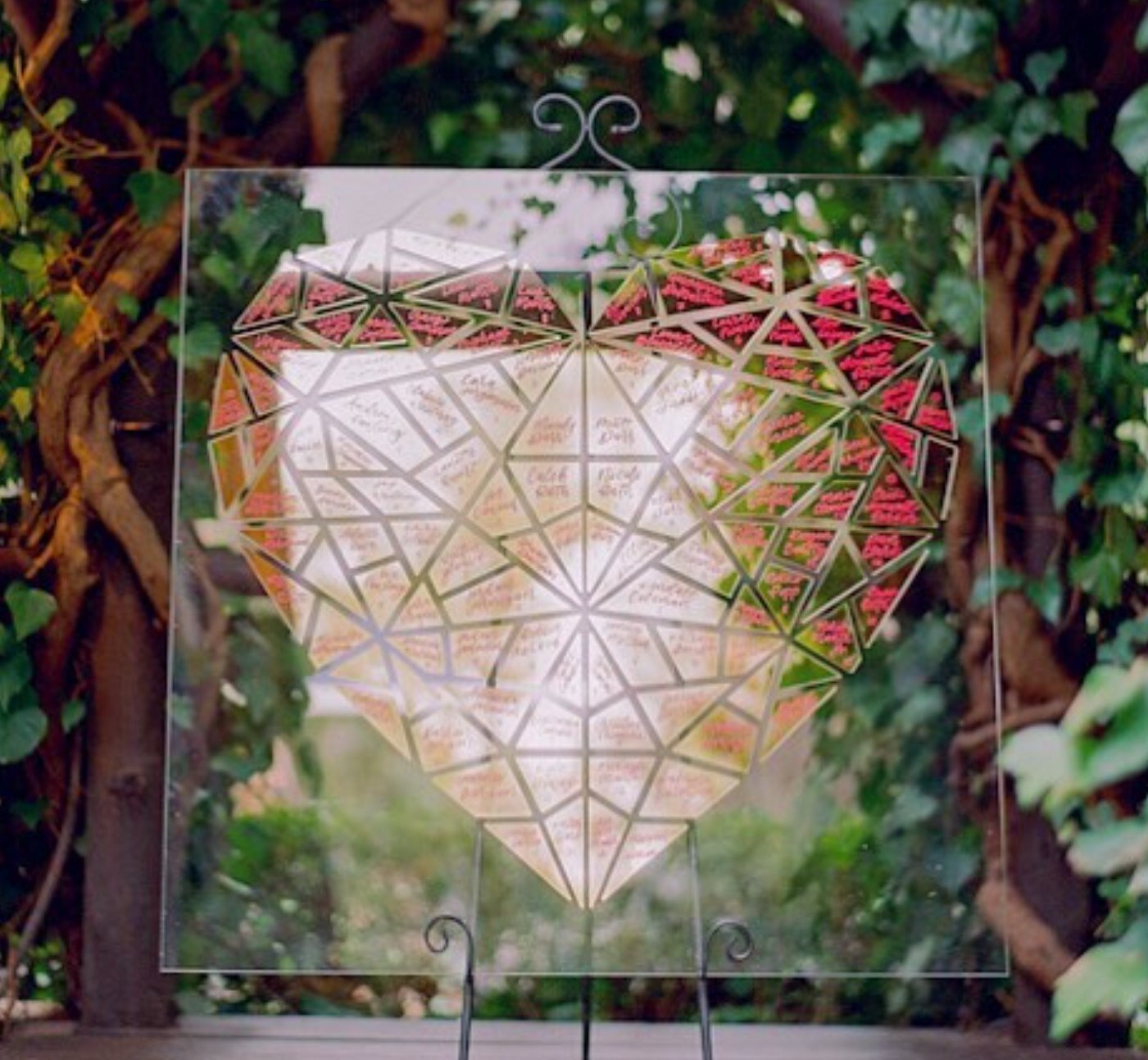 Valentine's Day is just around the corner, so it's the perfect time to share the some love-themed seating displays. It was a bit of a puzzle to assemble but each gold heart fragment and guest found its place. ⁠
.⁠
.⁠
.⁠
⁠
#acrylicweddingsign #wedding