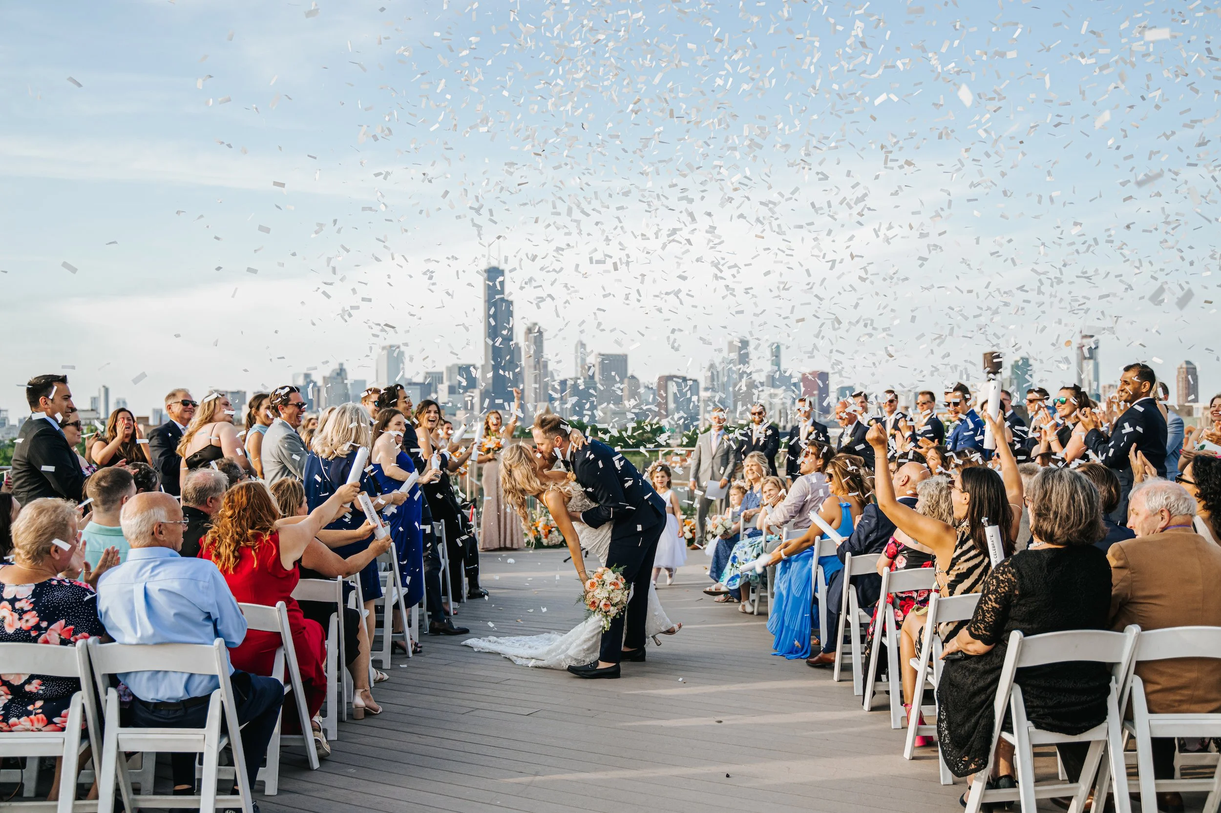 bride-and-groom-kiss-on-wedding-day-rooftop-chicago.jpg