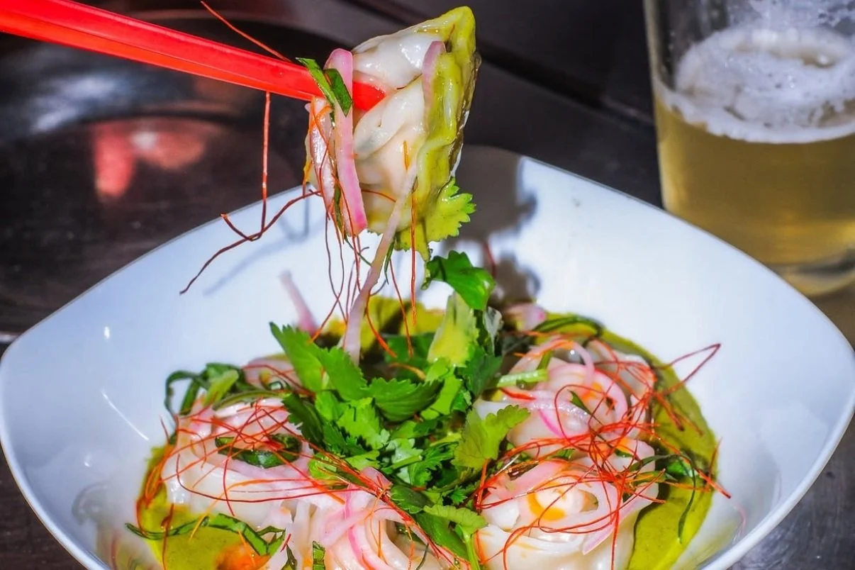 dicky's dumps shrimp and scallop dumplings in dd mau's vietnamese green curry sauce