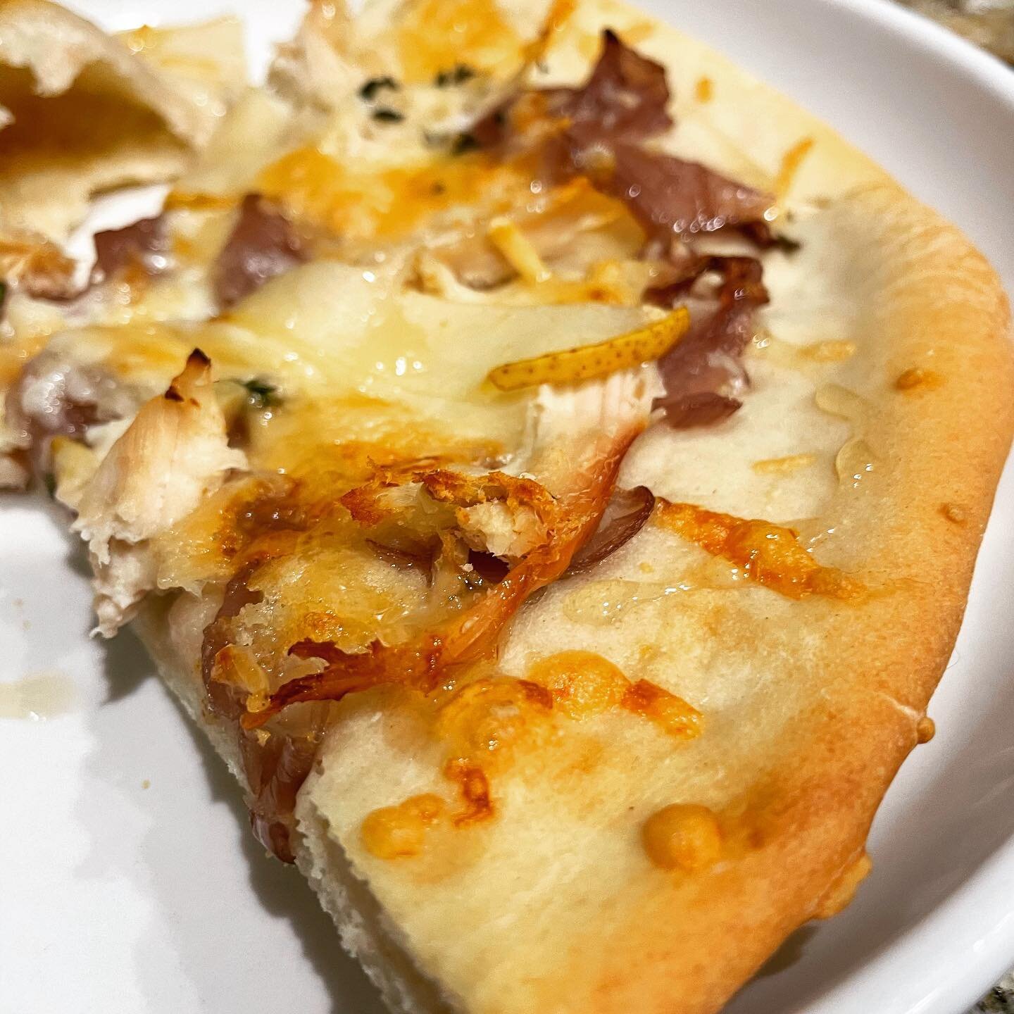 Practice pizza for next week&rsquo;s class. Caramelized Onions, Chicken, Fresh Pear, Thyme and a Drizzle of Honey.  #pizza #yum #sensorycooking #fridaynightpizzanight