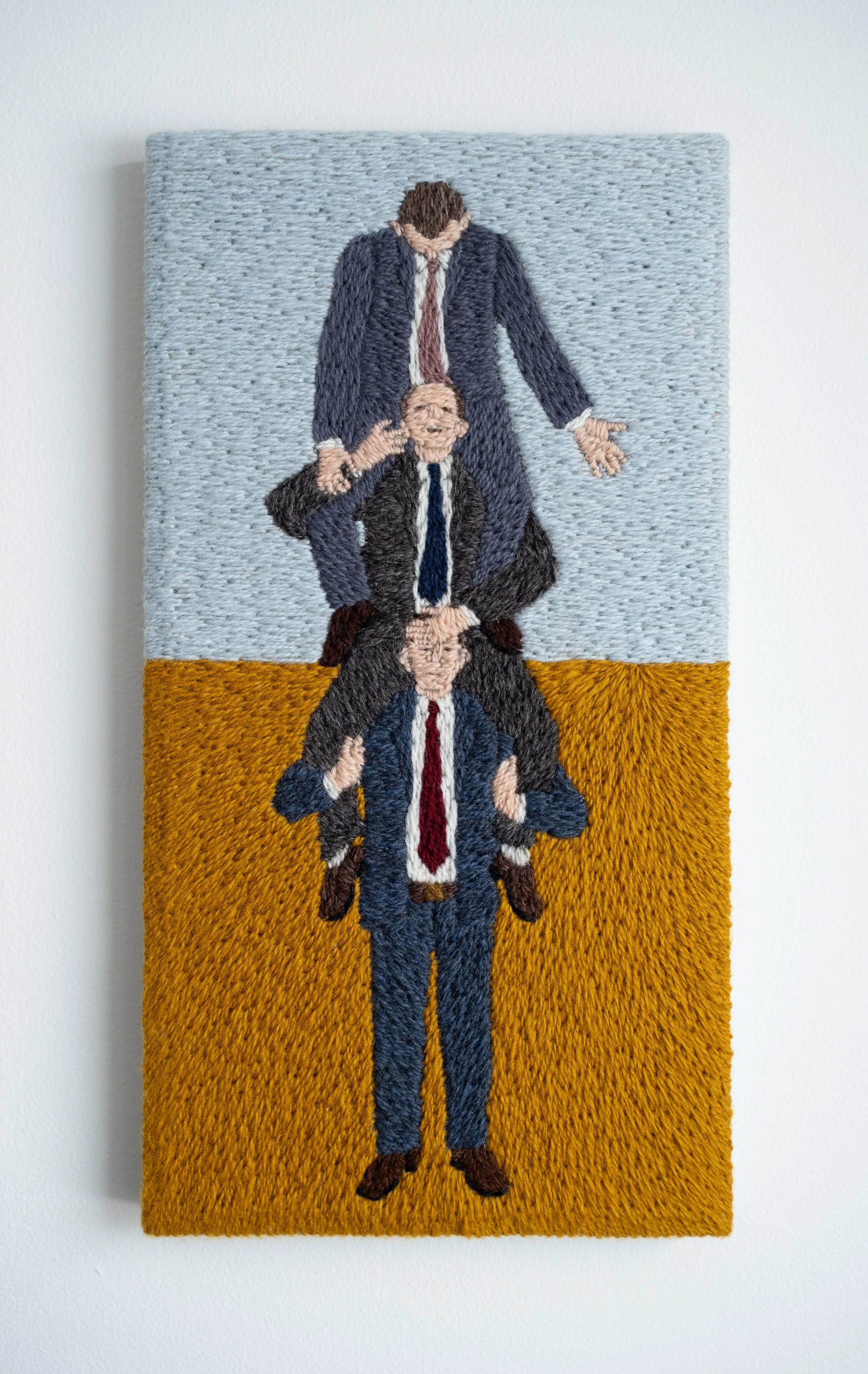 Three Stacked Men 2026.jpg