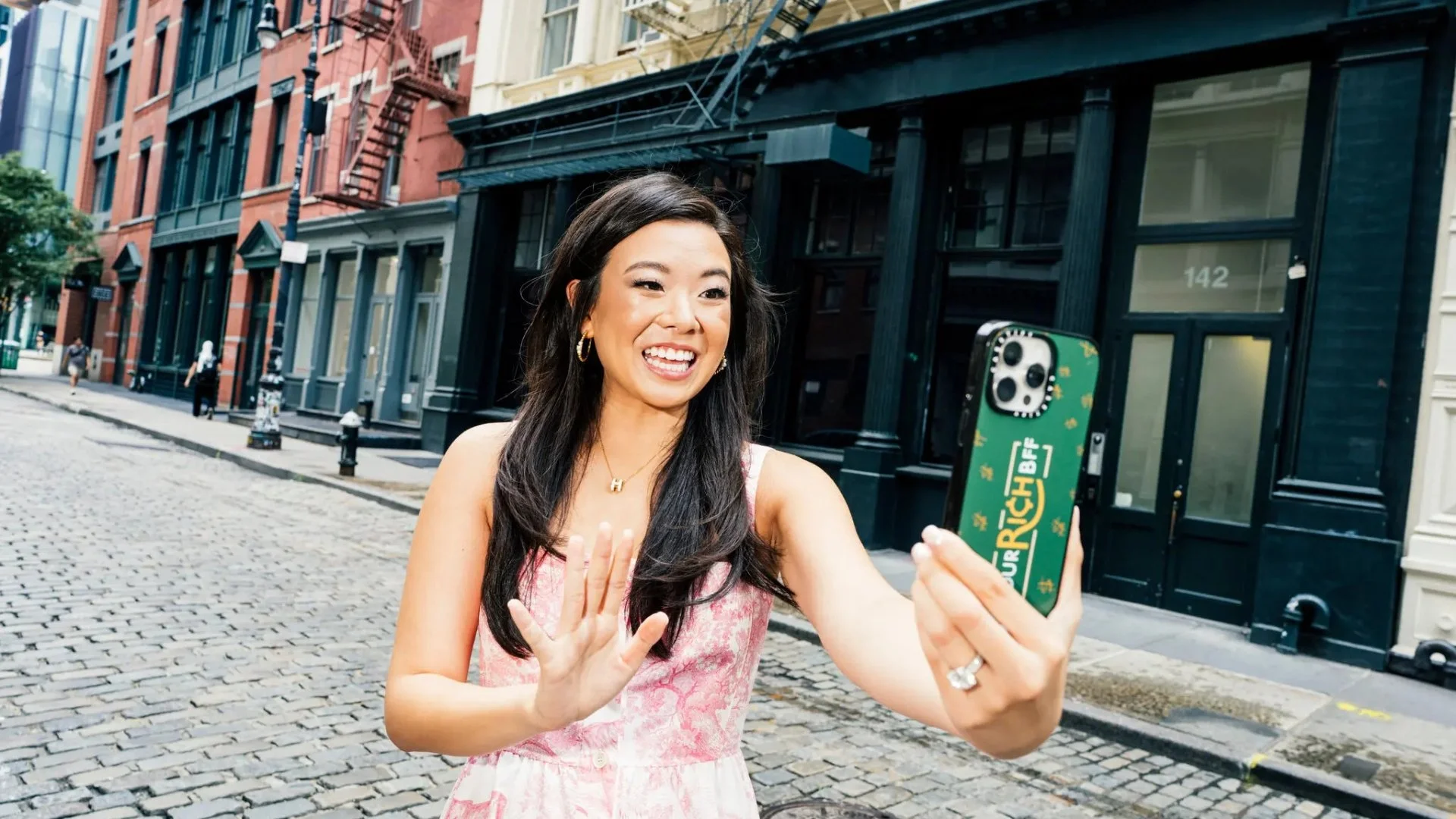 Vivian Tu (YourRichBFF) giving direct, empowering financial advice in a TikTok video.