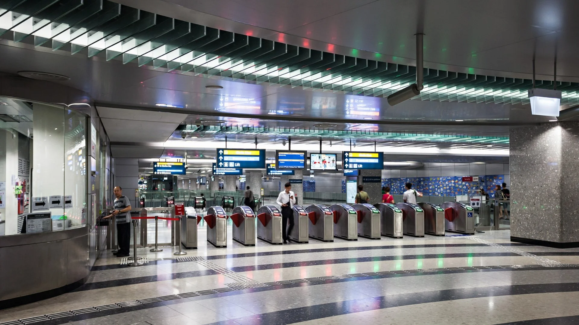 A busy MRT train in Singapore, highlighting the efficient and affordable public transportation system.