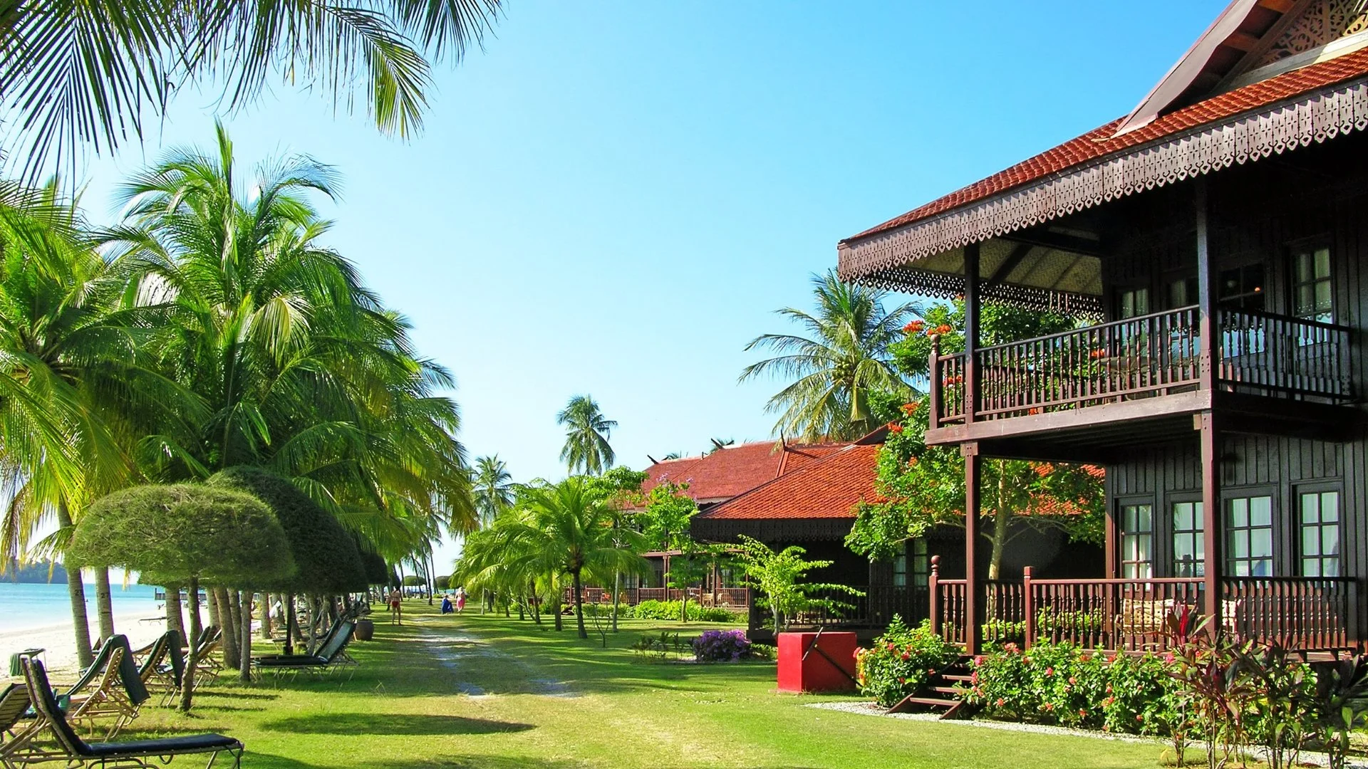 Luxury overwater villa and rainforest scenery in Langkawi, Malaysia.