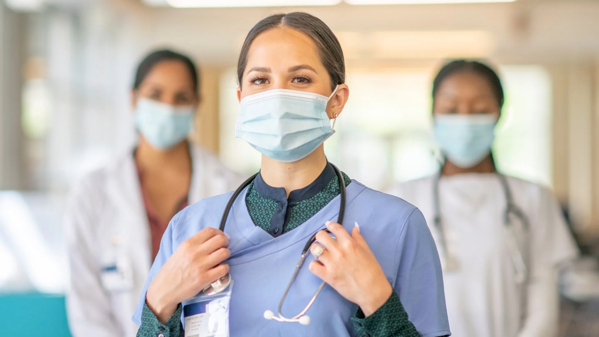 Healthcare and life sciences professionals collaborating in a Singapore hospital, highlighting career growth.