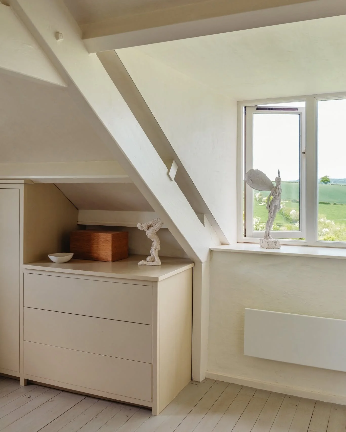 In the bedroom at Glafog, the windows frame views of the surrounding Welsh landscape, a constant reminder of the setting and it&rsquo;s heritage. To ensure the renovation complemented this rich history, Kate took cues from the classic characters of W