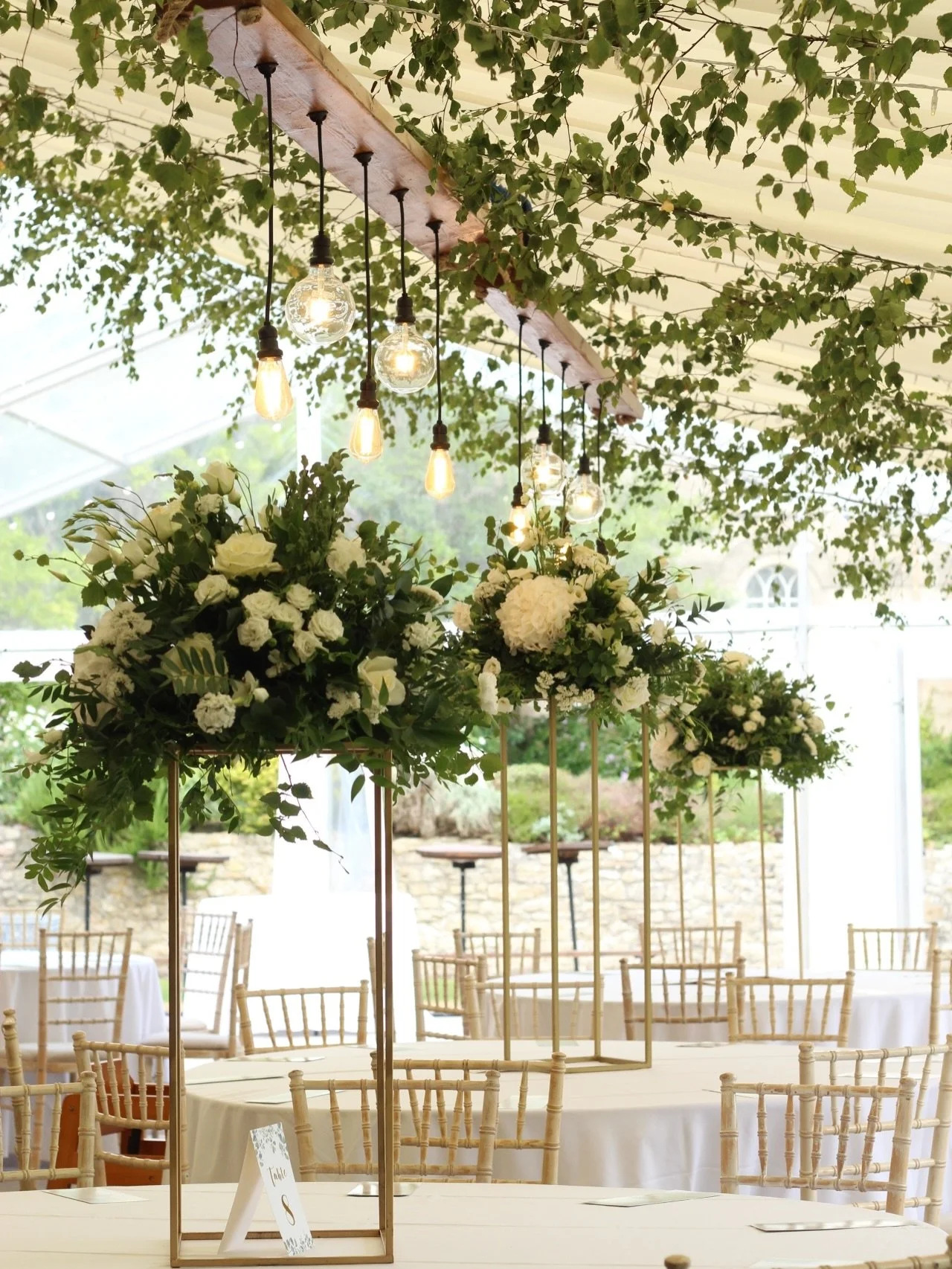Moments of magic inside the marquee at Hamswell House ✨

White and green blooms on gold risers, round tables dressed with crisp white linen and a dreamy ceiling of trailing greenery, wooden boards and warm hanging Edison lights.

There&rsquo;s nothin