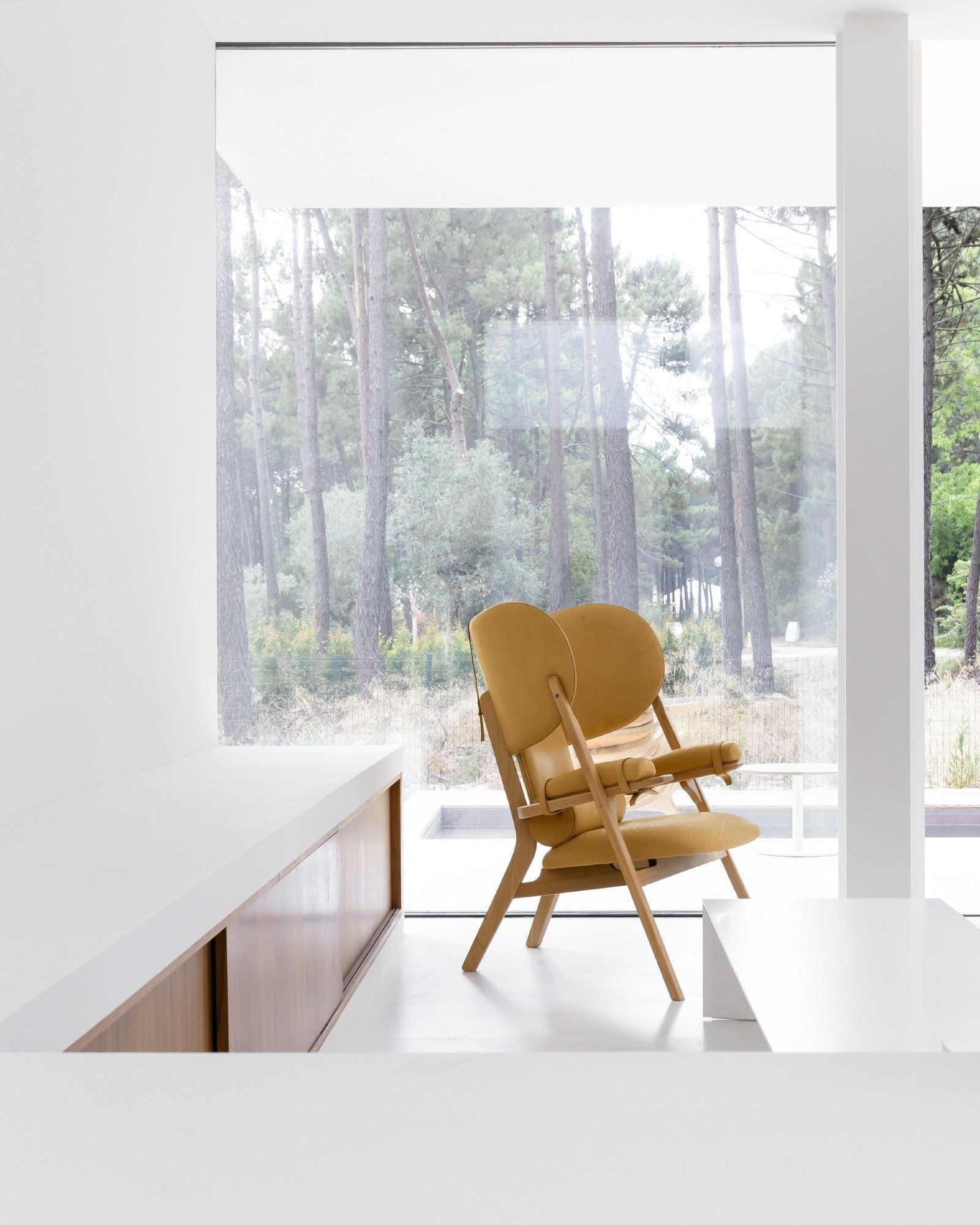 With its bold silhouette and inviting comfort, the Adamastor Lounge Chair by @marco_sousasantos  for @@branca_design  transform any space into a retreat. Shown here at Casa Herdade da Aroeira by @inescortesao.arq, this piece combines aesthetic streng