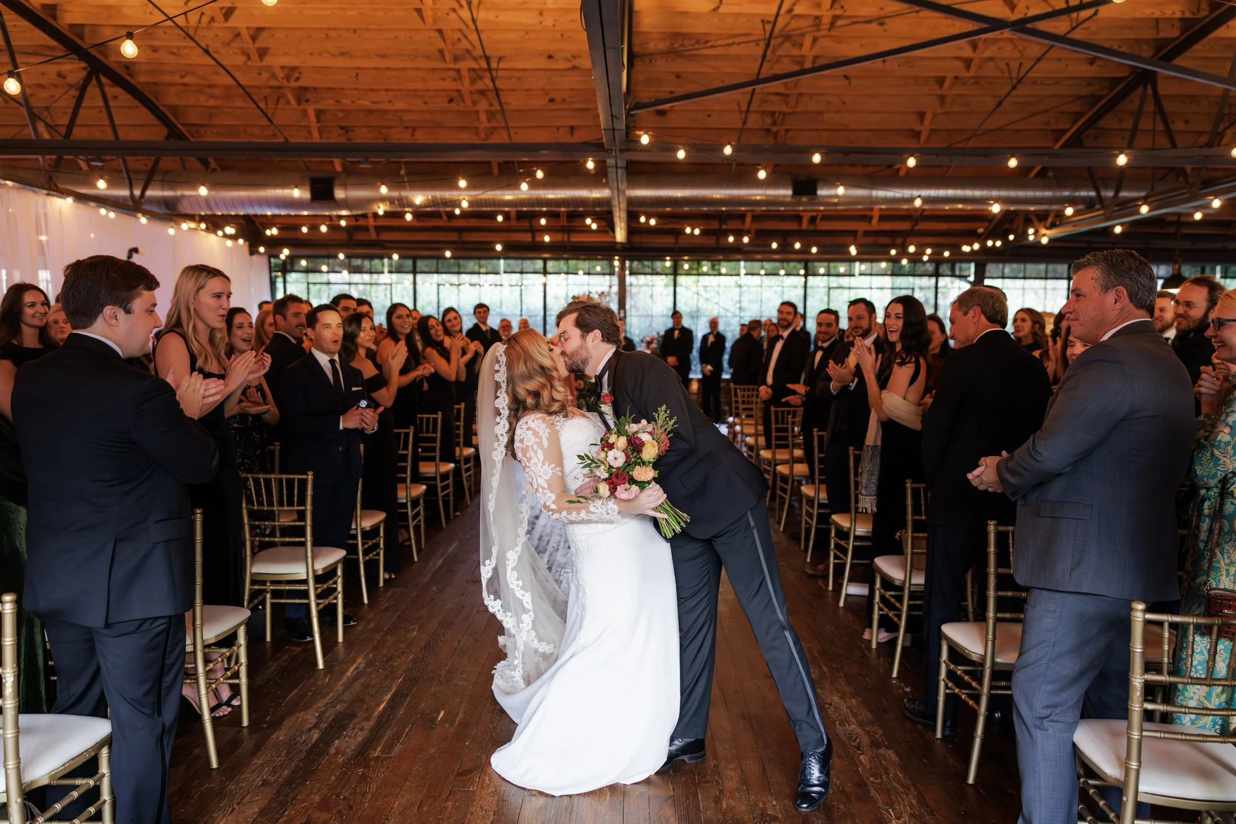 atlanta-wedding-summerour-ceremony-aisle-dip-kiss.jpg