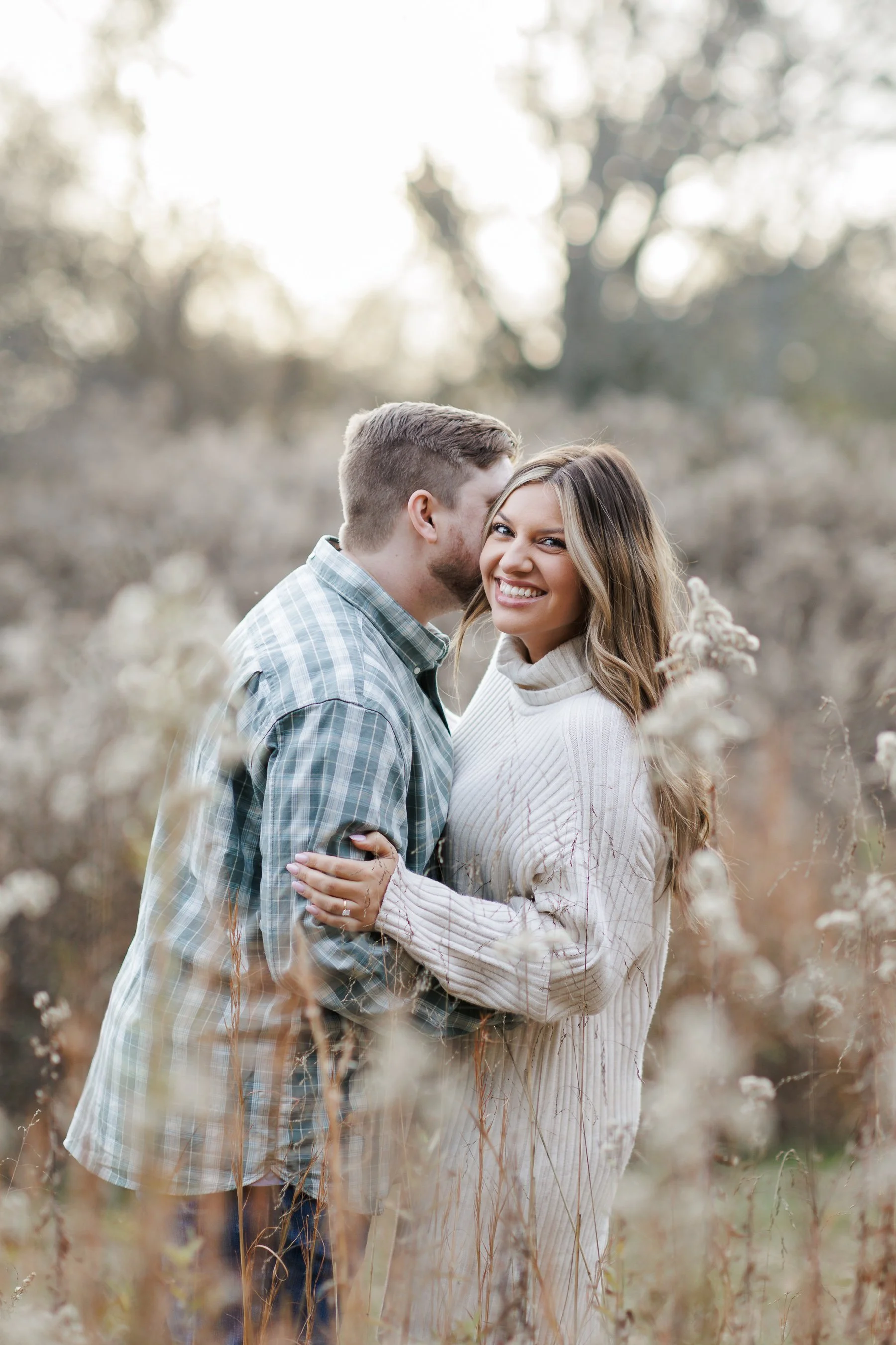 serenbe-engagement-session-beth-and-keegan-field-embrace.jpg