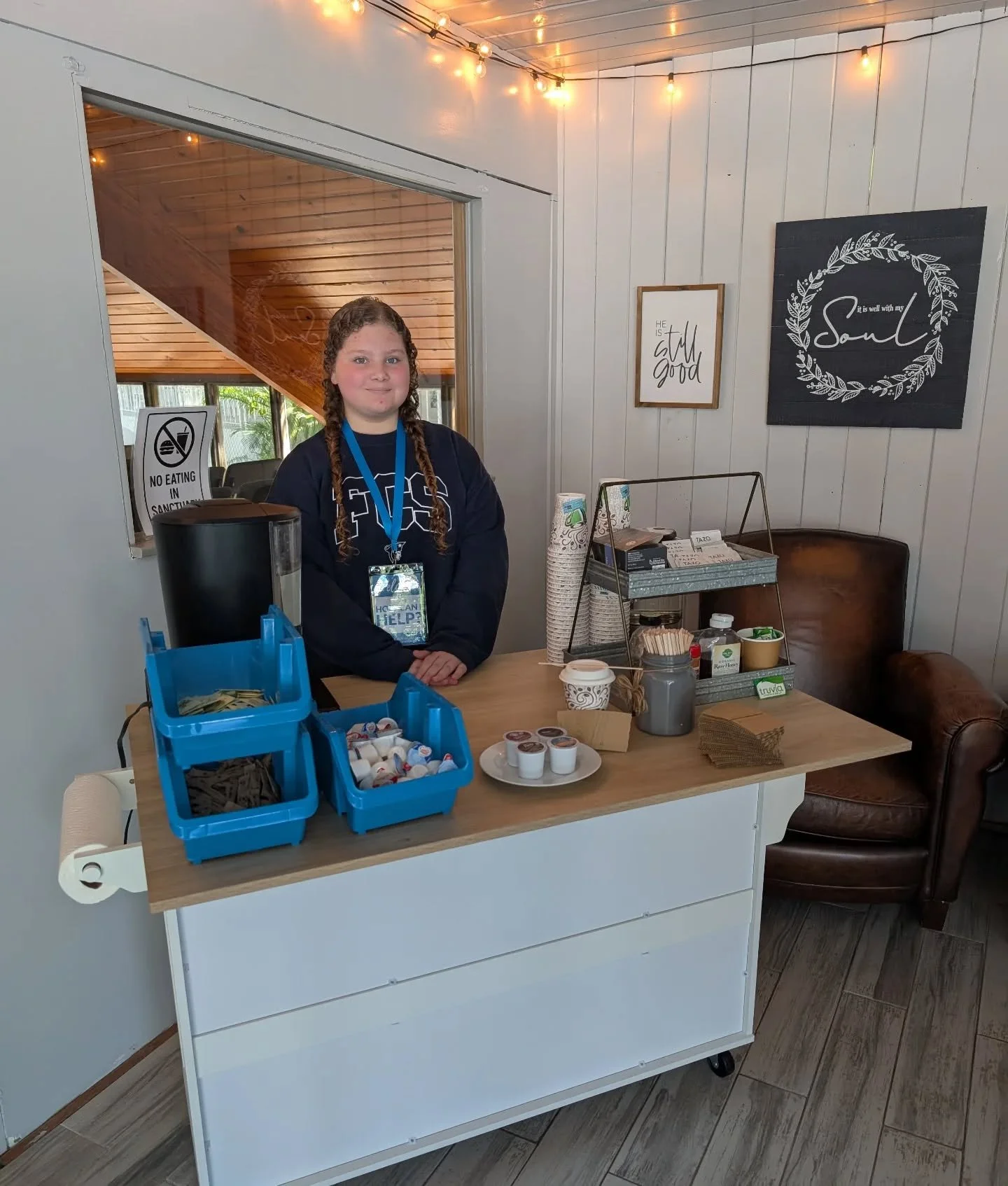 Our sweet barista, Kaylee, serving coffee and tea this morning, loving our new coffee area! ❤️☕