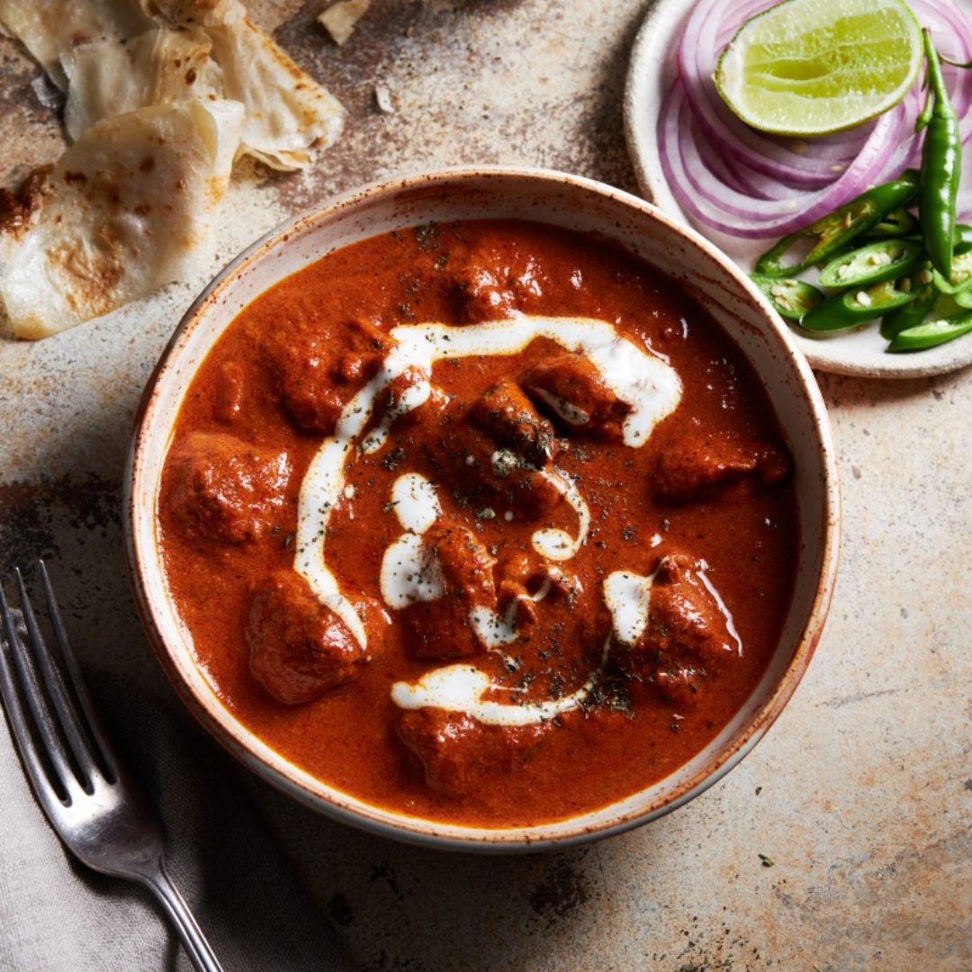 Butter Chicken paired with a Classic Rum Punch