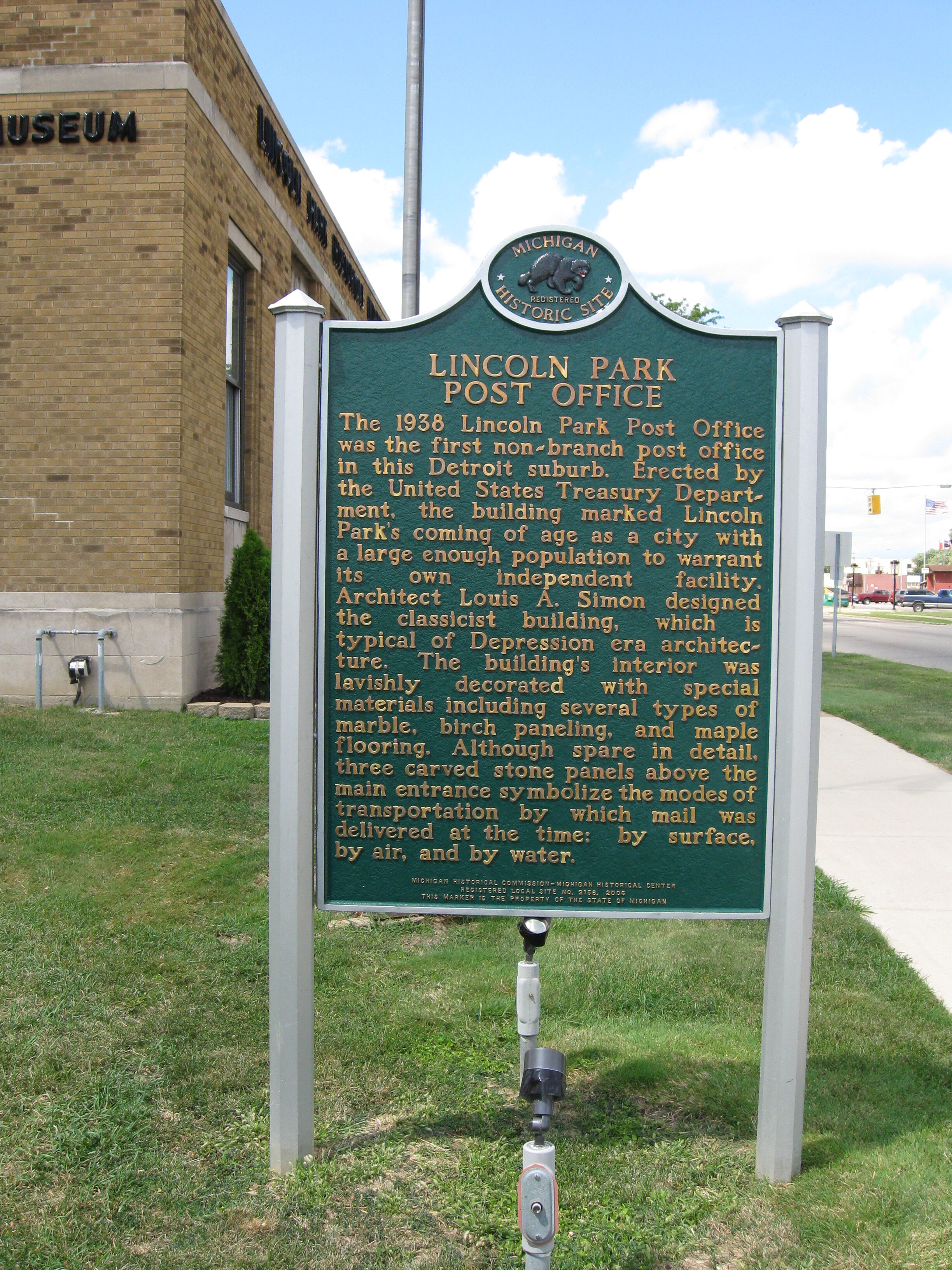 Michigan Historical Site Marker No. 2156 for the Lincoln Park Post Office building, shown after it was installed and dedicated in 2007
