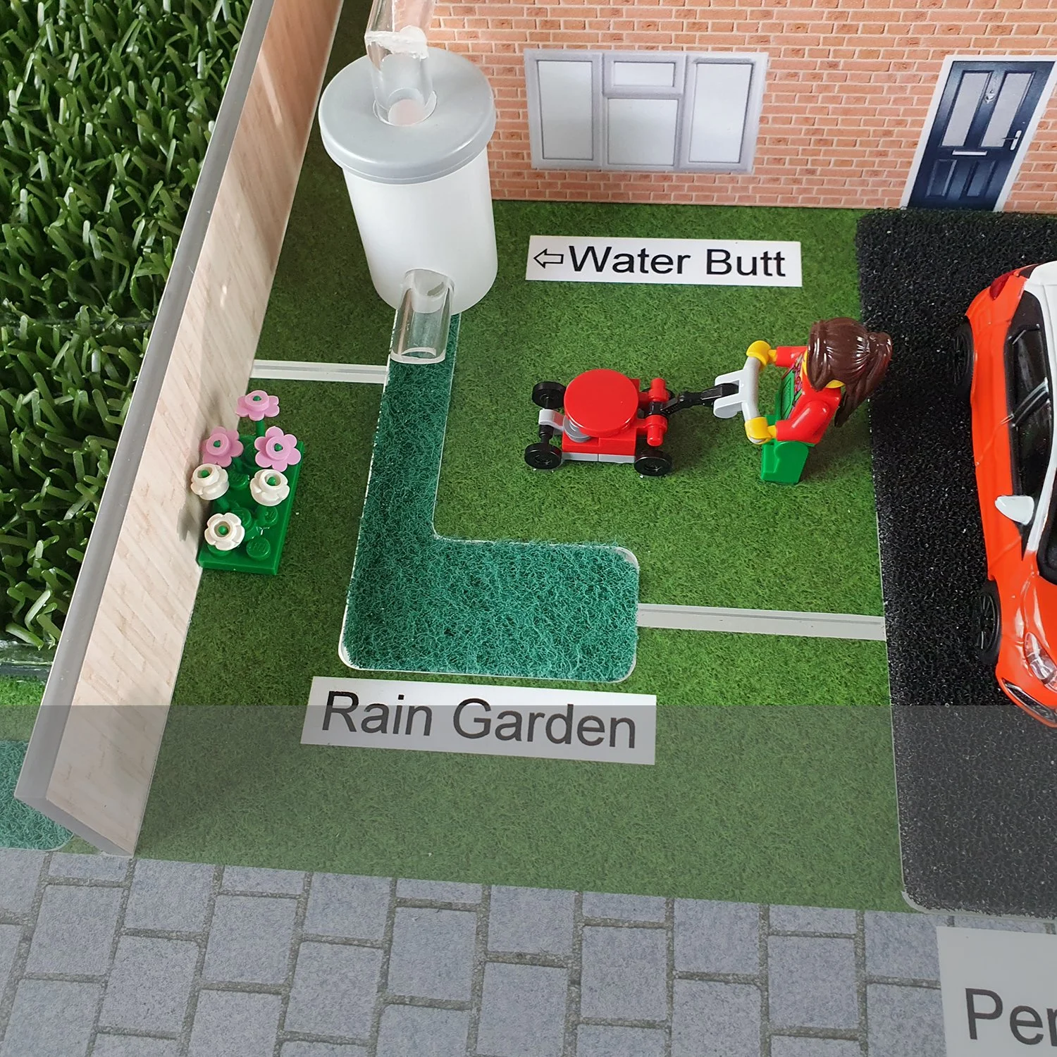 The rain garden also captures rainfall, again allowing some rain to infiltrate into the ground, and some is channelled to the detention basin.