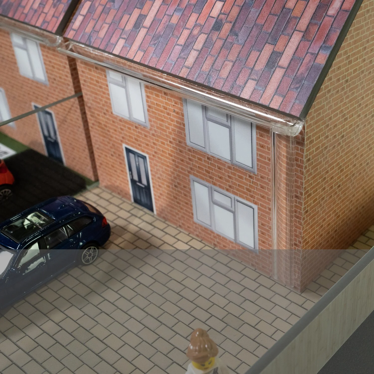 Water from the roof of the house is channelled by the gutters and drainpipe, but it is not collected.