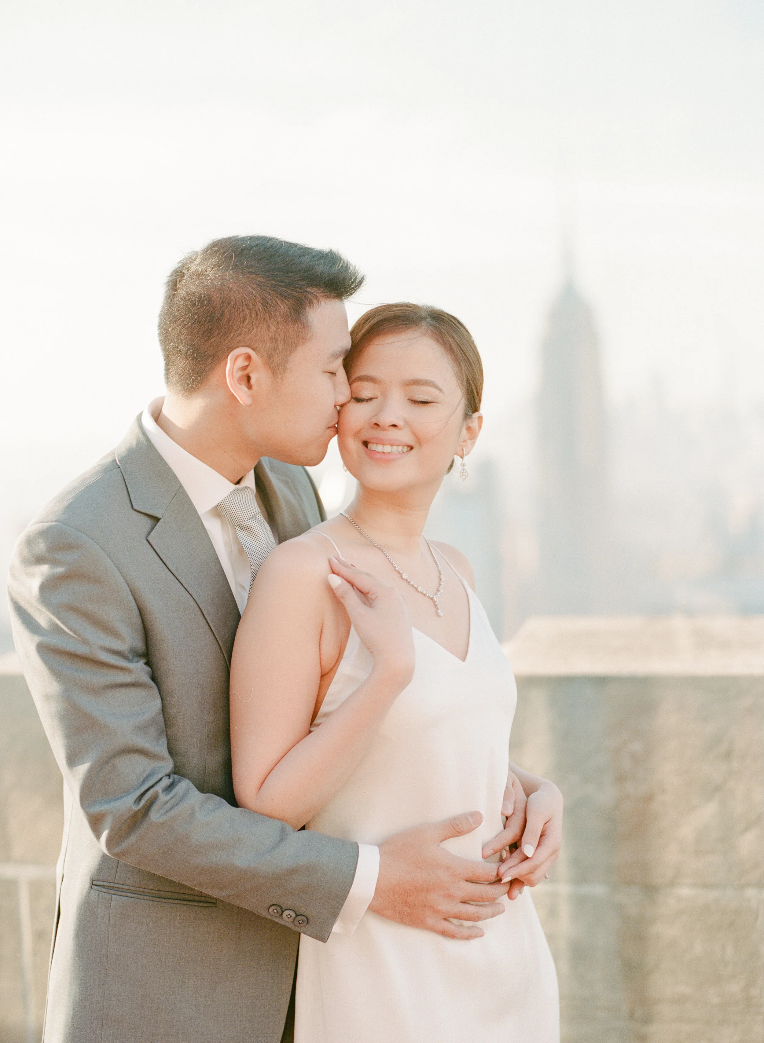 Top Of the Rock engagement session with Empire State Building in the background - New York City wedding photographer - Oklahoma City Wedding Photographer