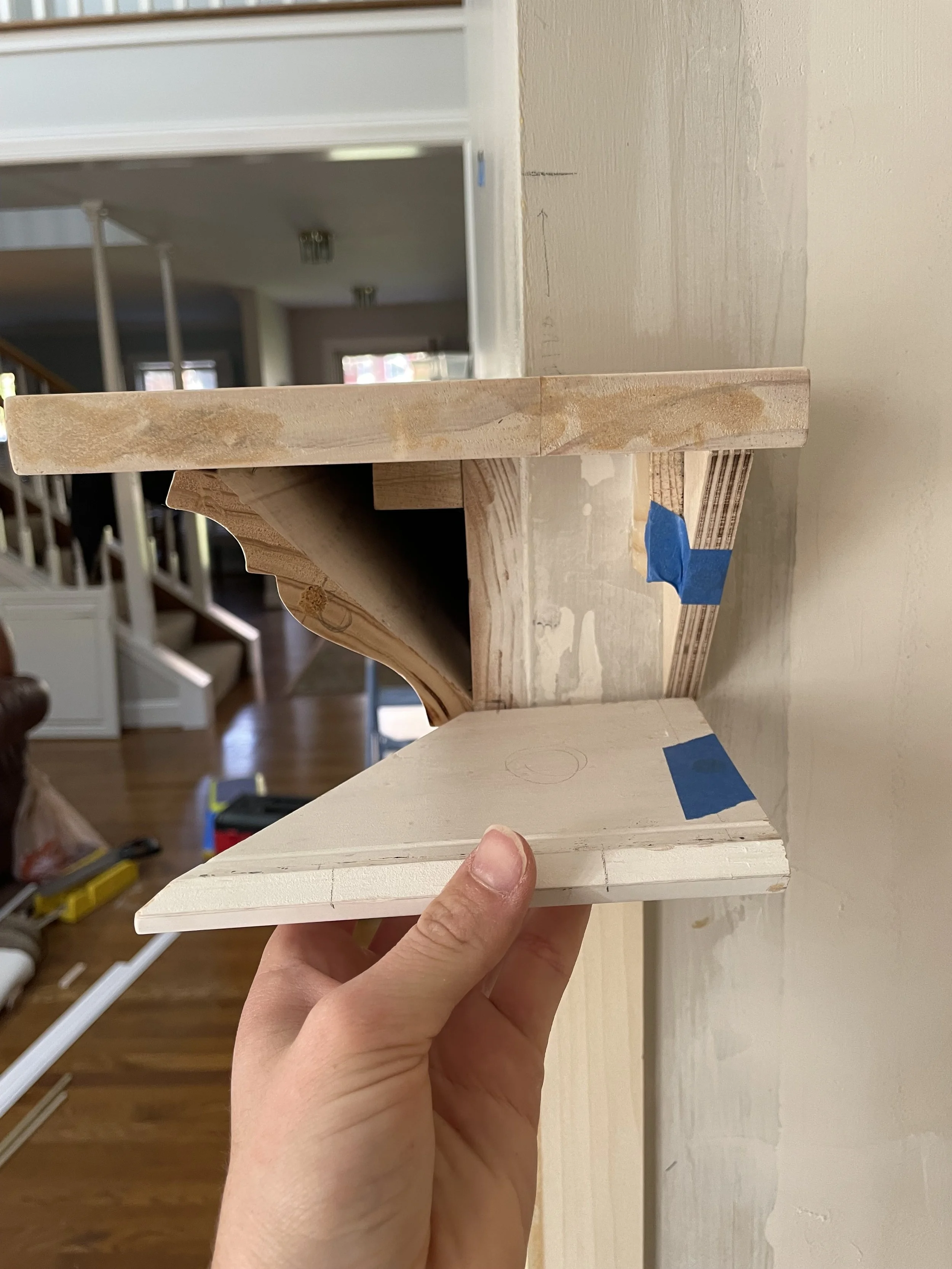 the mantle was designed to be hollow with a magnetic end piece to allow TV and sound bar wires to be easily fed down to an outlet in the right cabinet