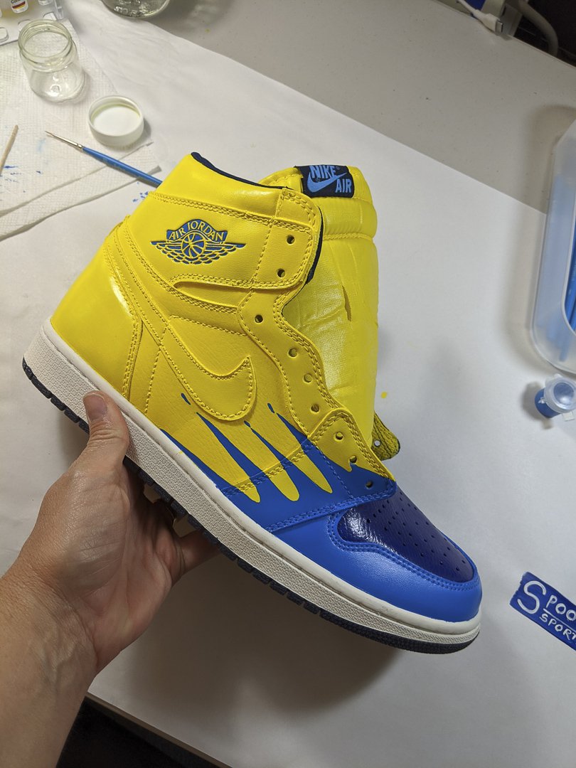 Custom Air Jordan 1 sneakers with Spoon Sports Livery