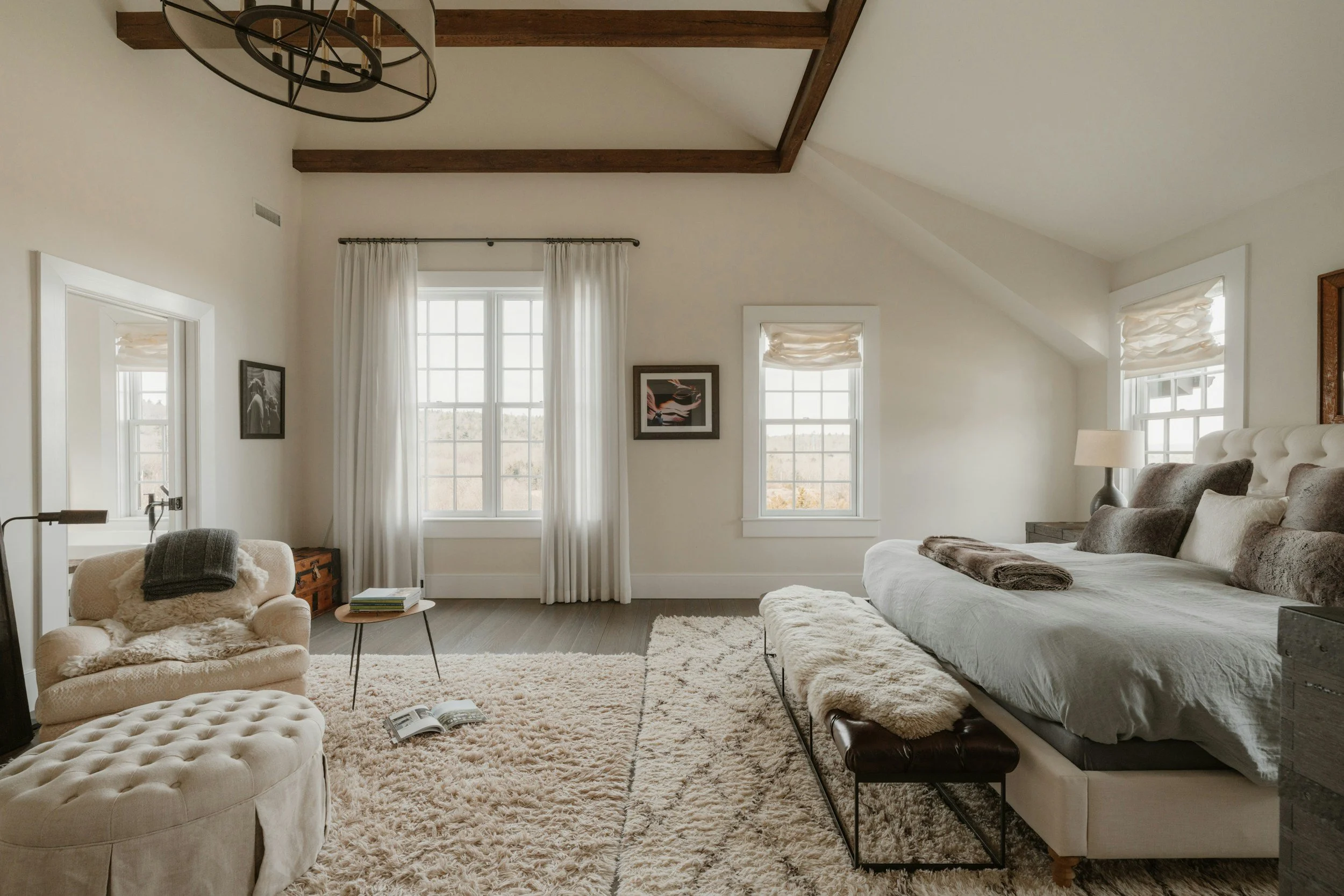 bedroom with a large window, comforting bedroom