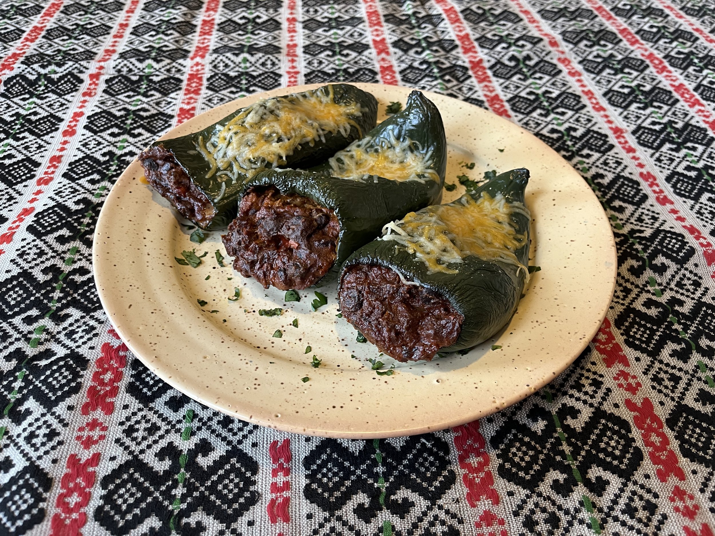 Stuffed Poblanos with Red Chile, Chorizo, and Black Beans