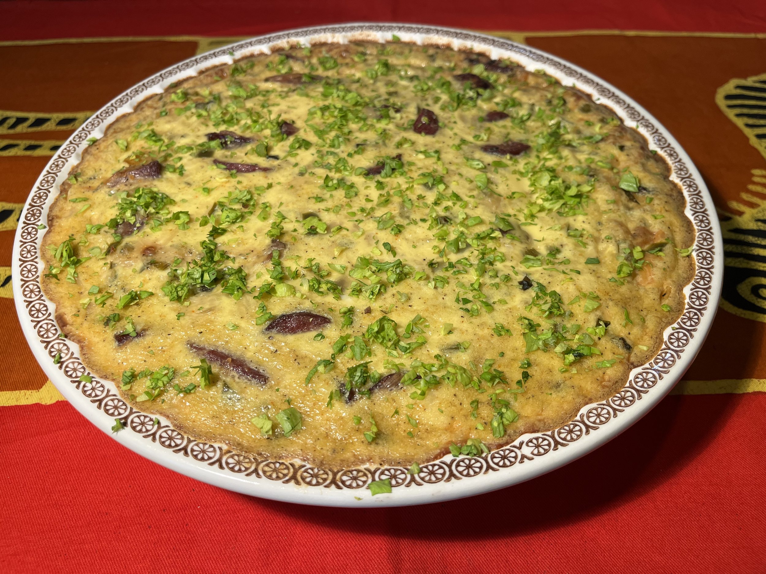 Smoked Sausage and Rum Quiche with Cane Vinegar Onions