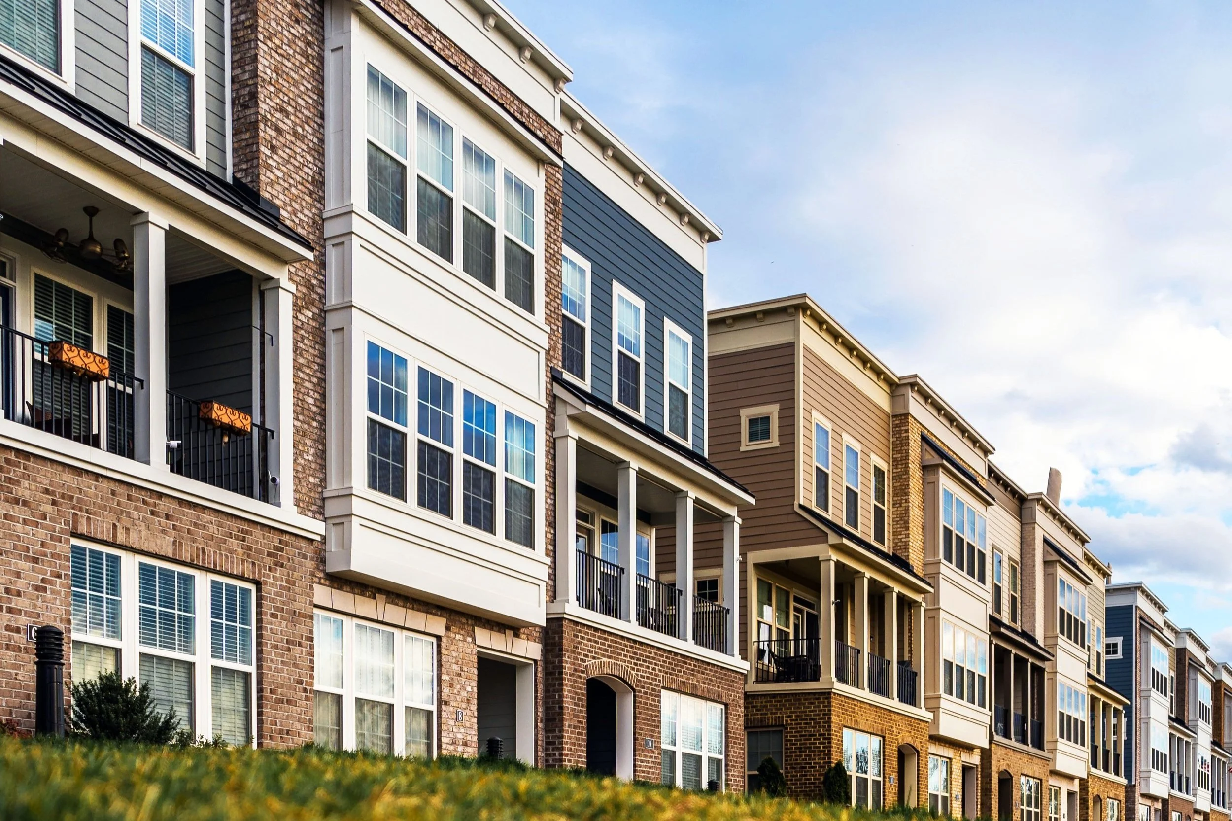 line of apartments in the day time