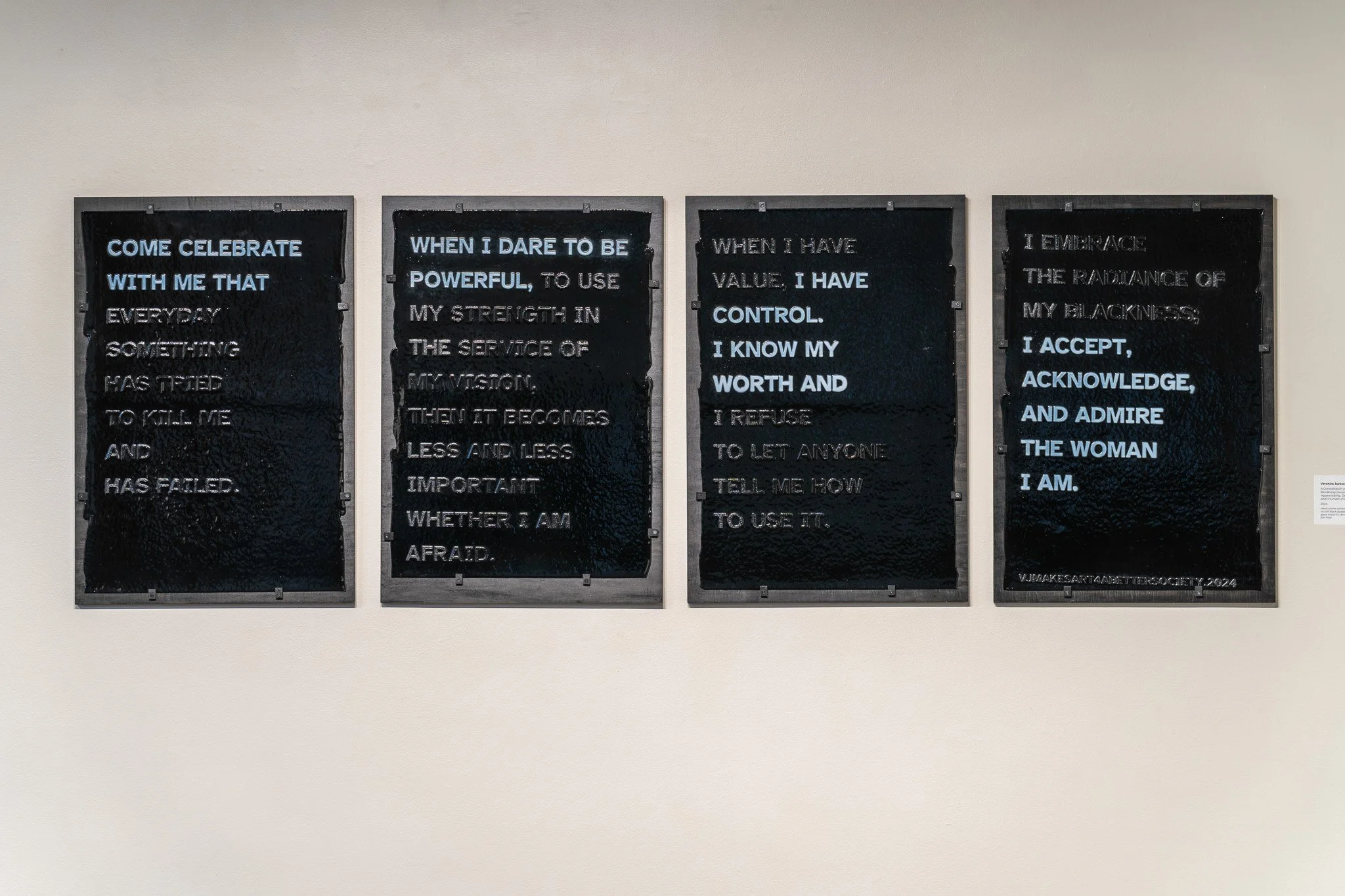 Veronica Jackson,  A Constellation of Blackness: Rendering Invisibility, Hypervisibility, Devaluation, and Triumph; (TRIUMPH) , 2024, hand-screen printed broadsides on stiff black opalescent Bullseye glass, black frit, dense white frit, kiln fired 
