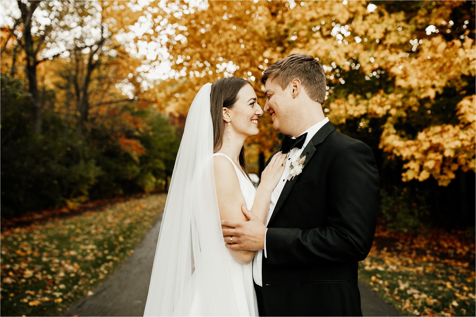  bride and groom fall colors wedding day foliage in wisconsin wedding mequon autumn couple happy love candid photos 