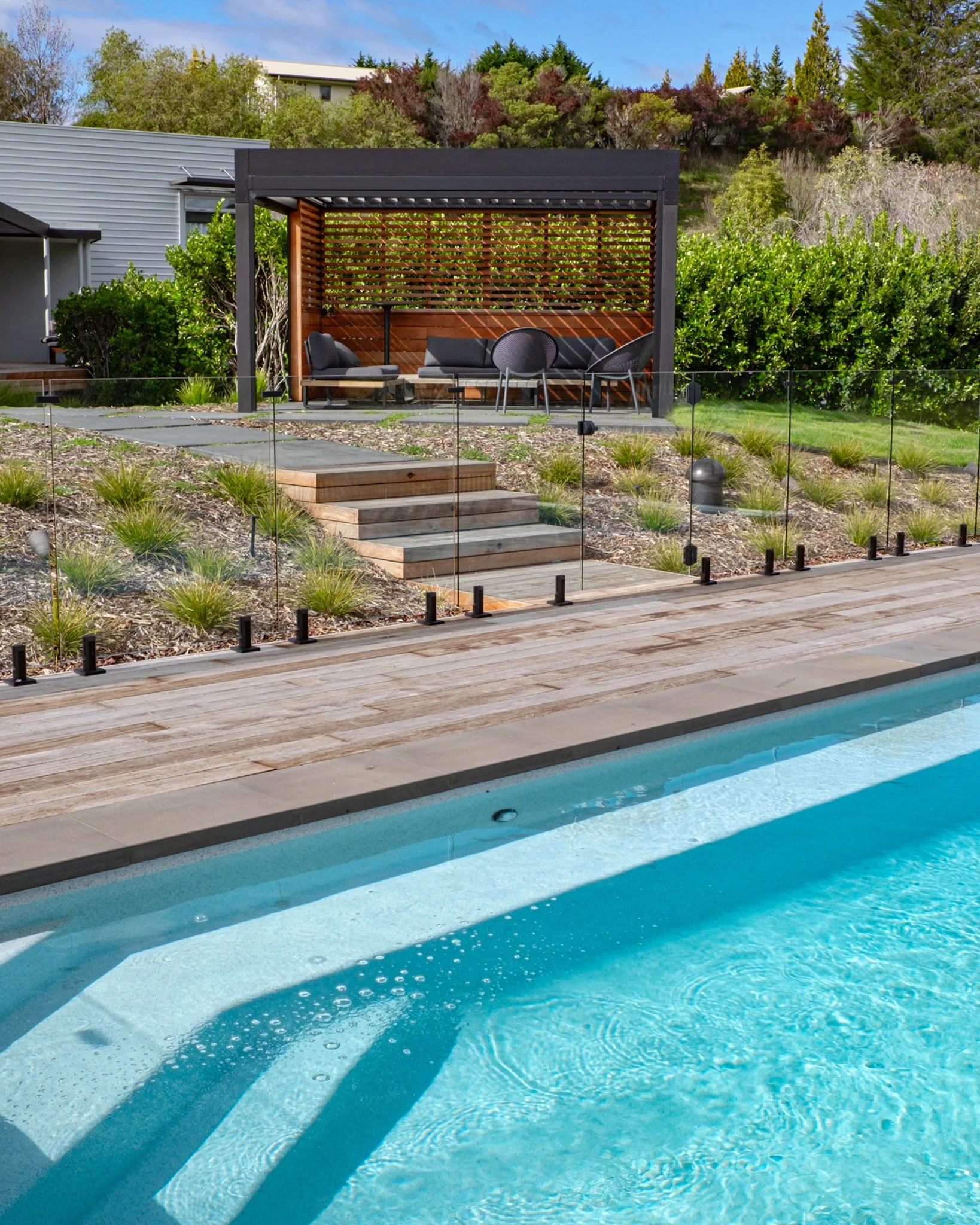 A custom-made louvre pergola offers the perfect spot to unwind while keeping an eye on the little ones enjoying the pool. ☀️💦
#nvp #nvpools #newvisionlandscapes #nvl #landscapearchitecture #landscapedesign #nvdesign #teamawesome #teamnvl #nelsontas