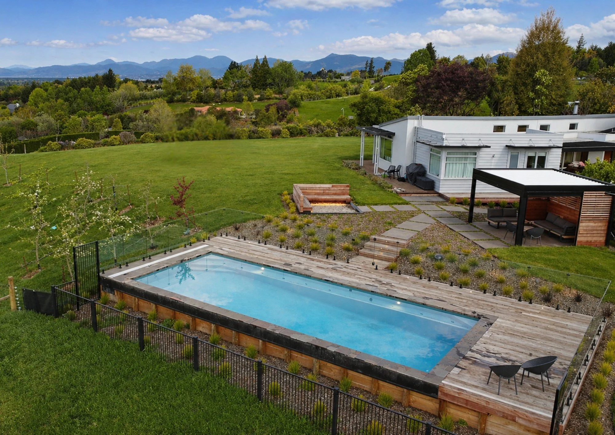An elevated view of the Aquatechnics Torino. This spacious area was the perfect spot for this majestic pool.

#nvp #nvpools #newvisionlandscapes #nvl #landscapearchitecture #landscapedesign #nvdesign #teamawesome #teamnvl #nelsontasman #nelsontasmann