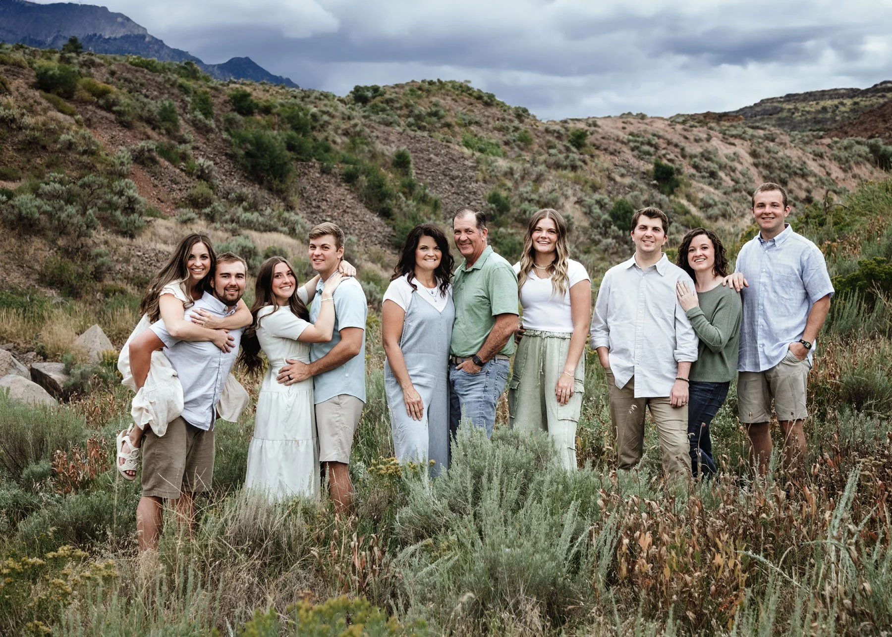 Family silhouette at sunset with warm golden sky