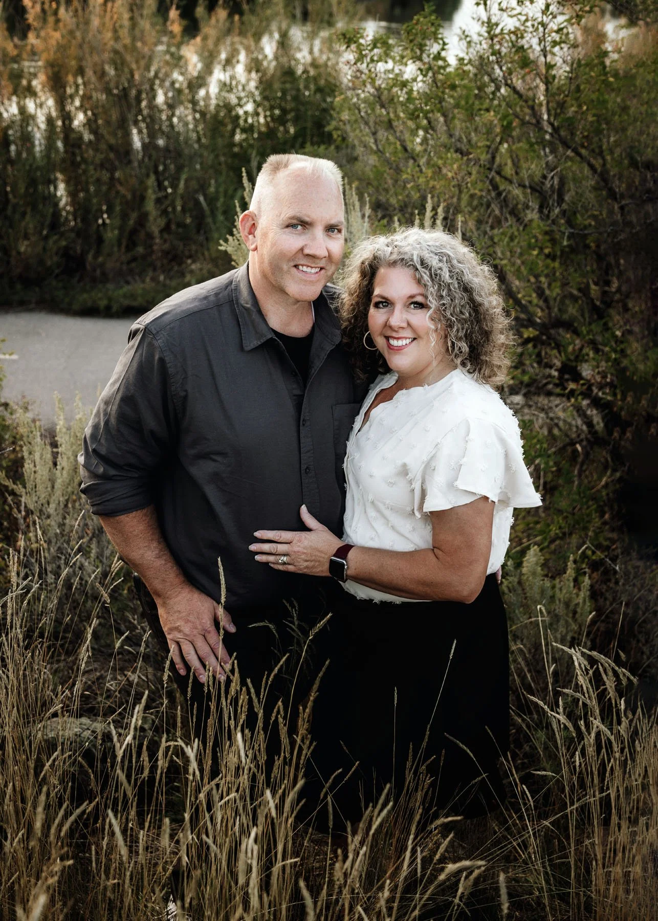 Family smiling together during scenic outdoor session